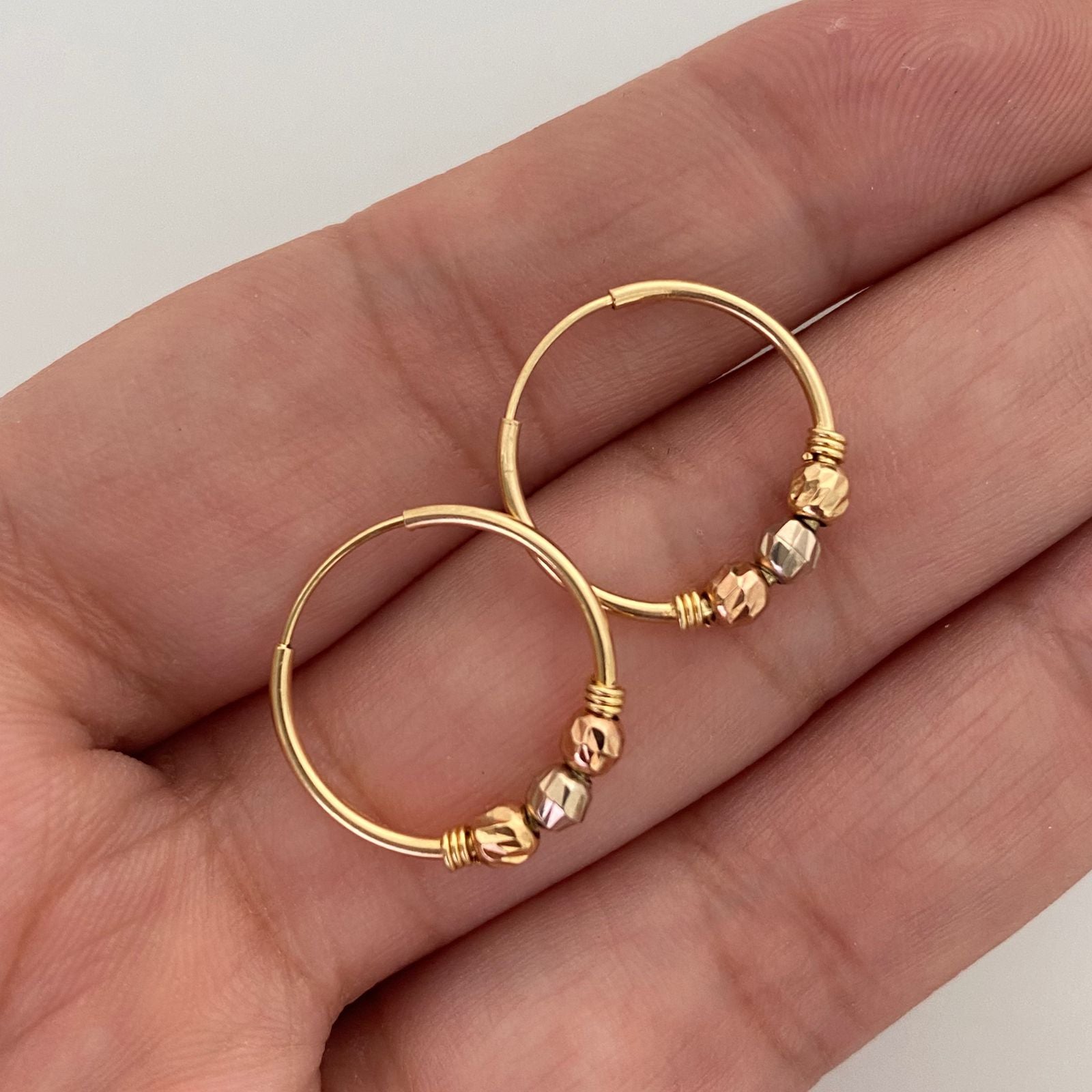 Candonga Bola diamantada 3mm Tres oros 18k 1,15 Gr / 1,5 Cm