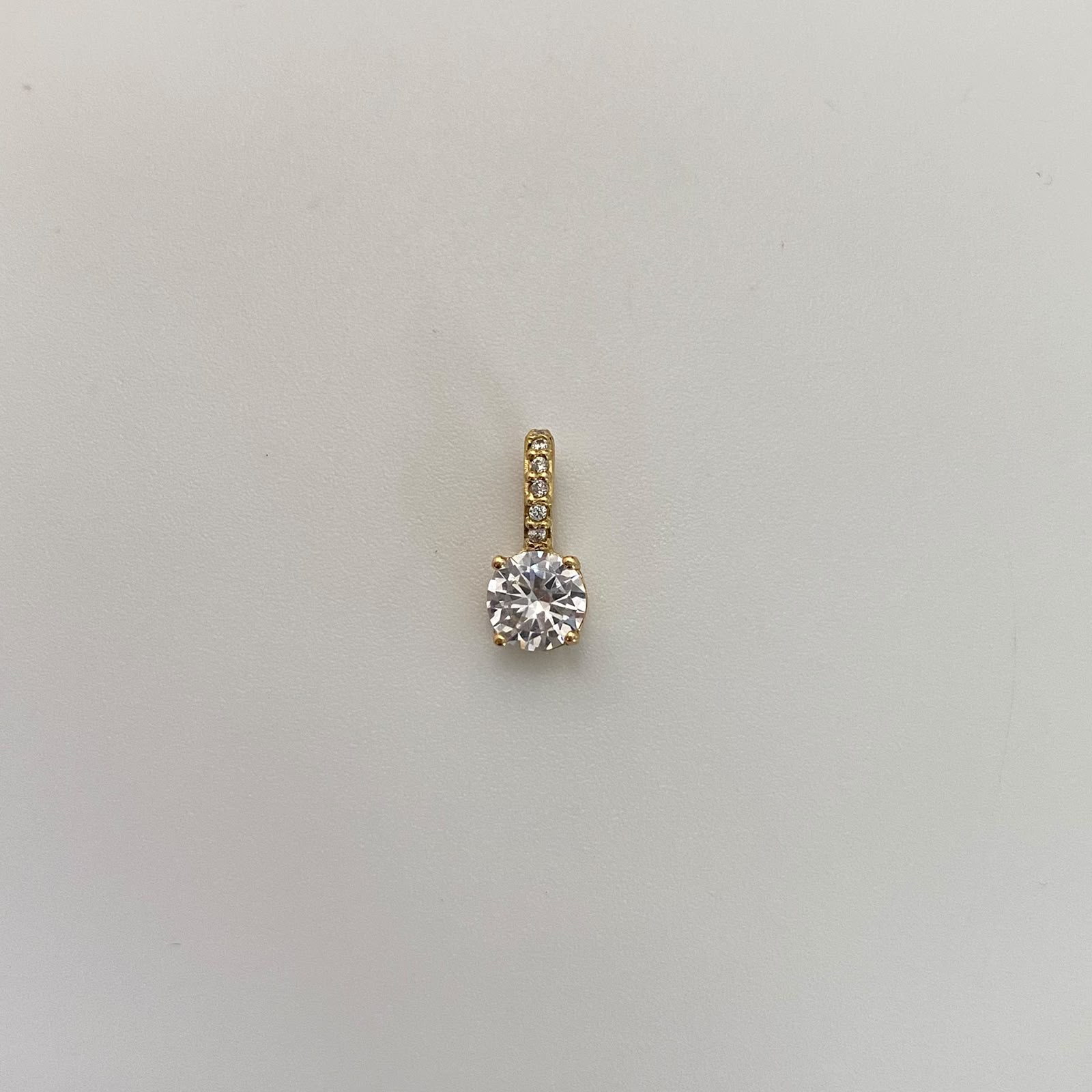 Dije Circon Blanco Oro amarillo 18k 0,95 Gr / 5,5 mm / 1,1 Cm
