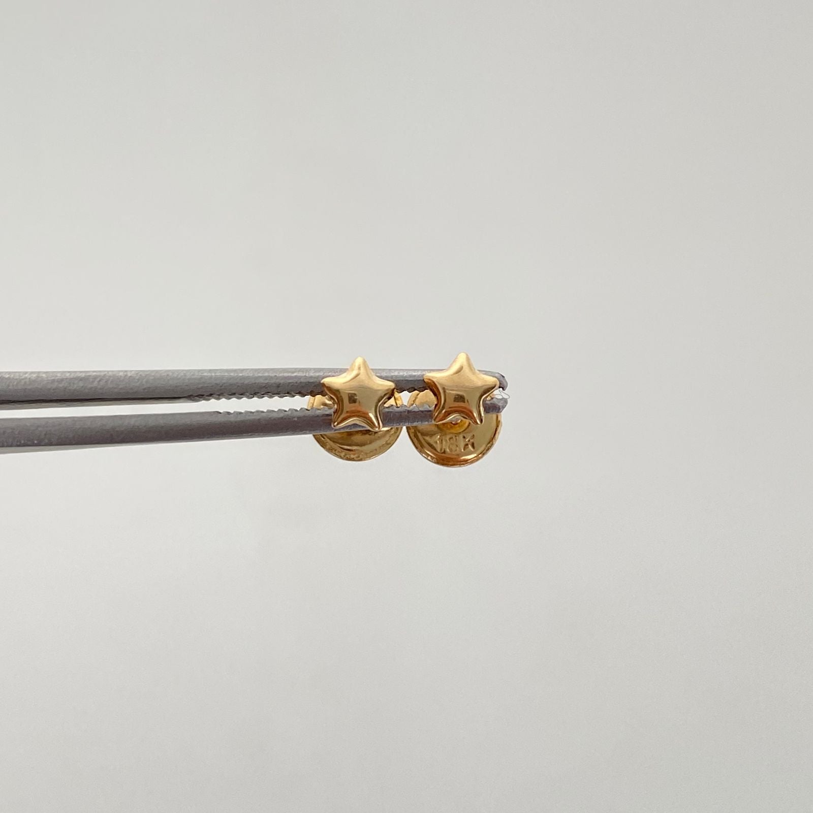 Topos topos mini estrella lisa  Oro amarillo 18k 0,4 Gr / 4,8 mm