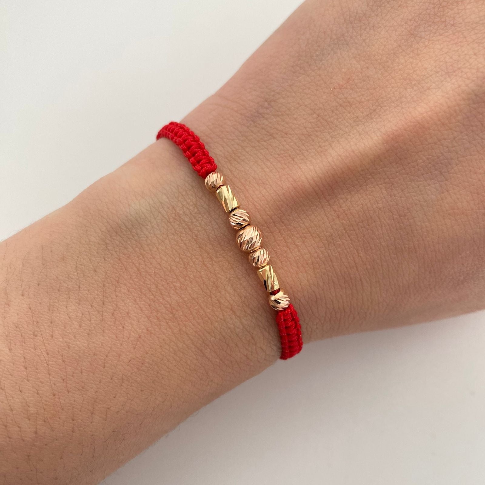 Pulsera tejida con cilindros y balines diamantados 5mm 4mm  Oro amarillo y Oro rosa 18k 0,75 Gr