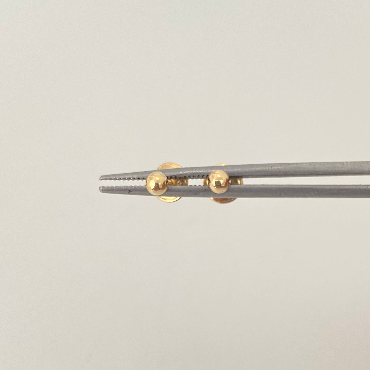 Topos media bola lisa Oro amarillo 18k 0,4 Gr / 3 mm