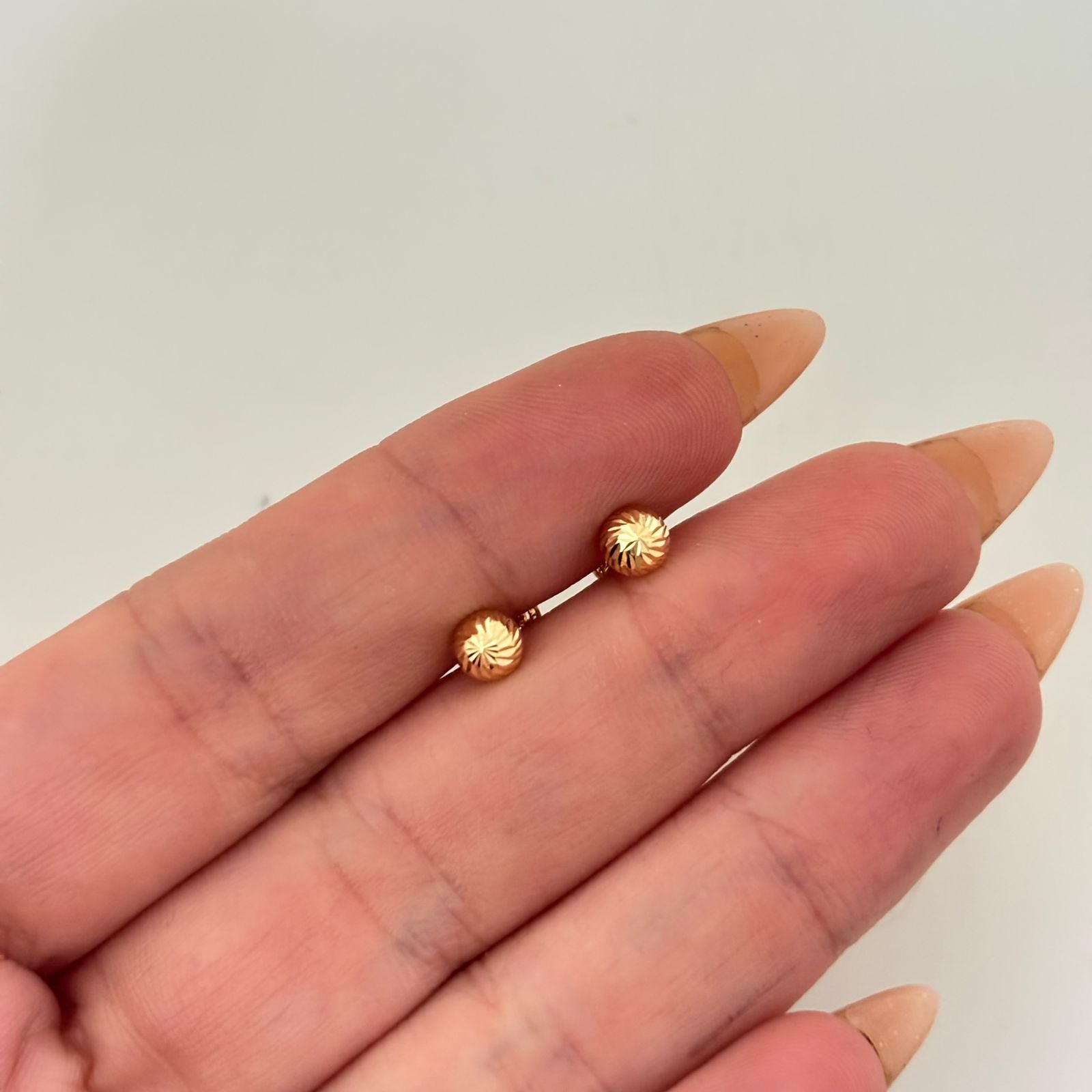 Topos bola diamantada  Oro amarillo 18k 0,6 Gr / 5 mm