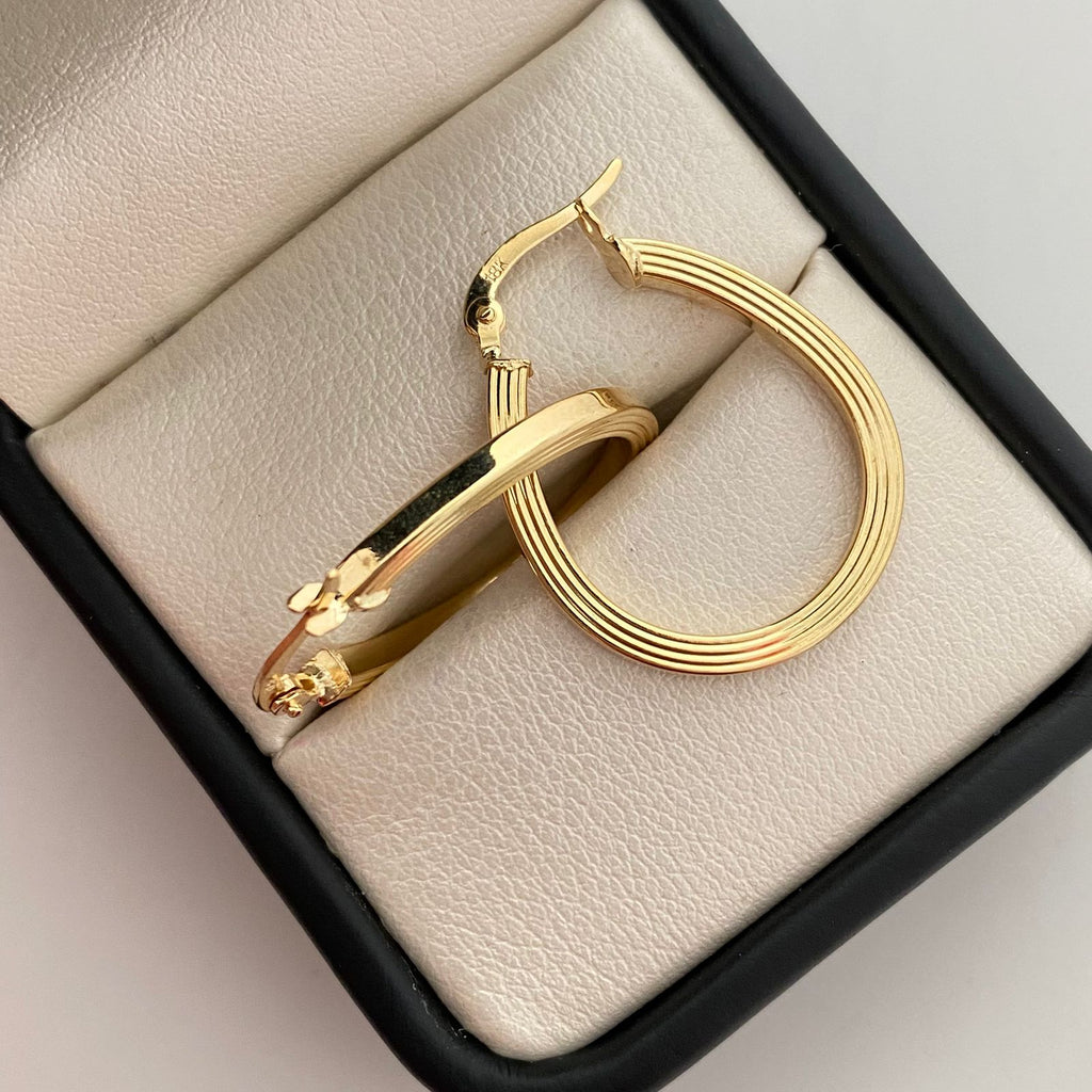 Candonga ovalada rayada  Oro amarillo 18k 2,15 Gr / 2,5 Cm