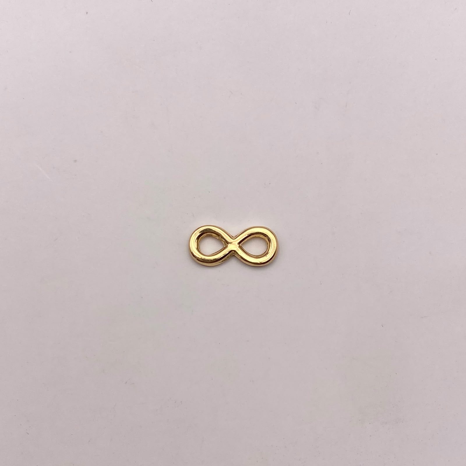 Herraje infinito Oro amarillo 18k 0,3 Gr / 1,3 Cm