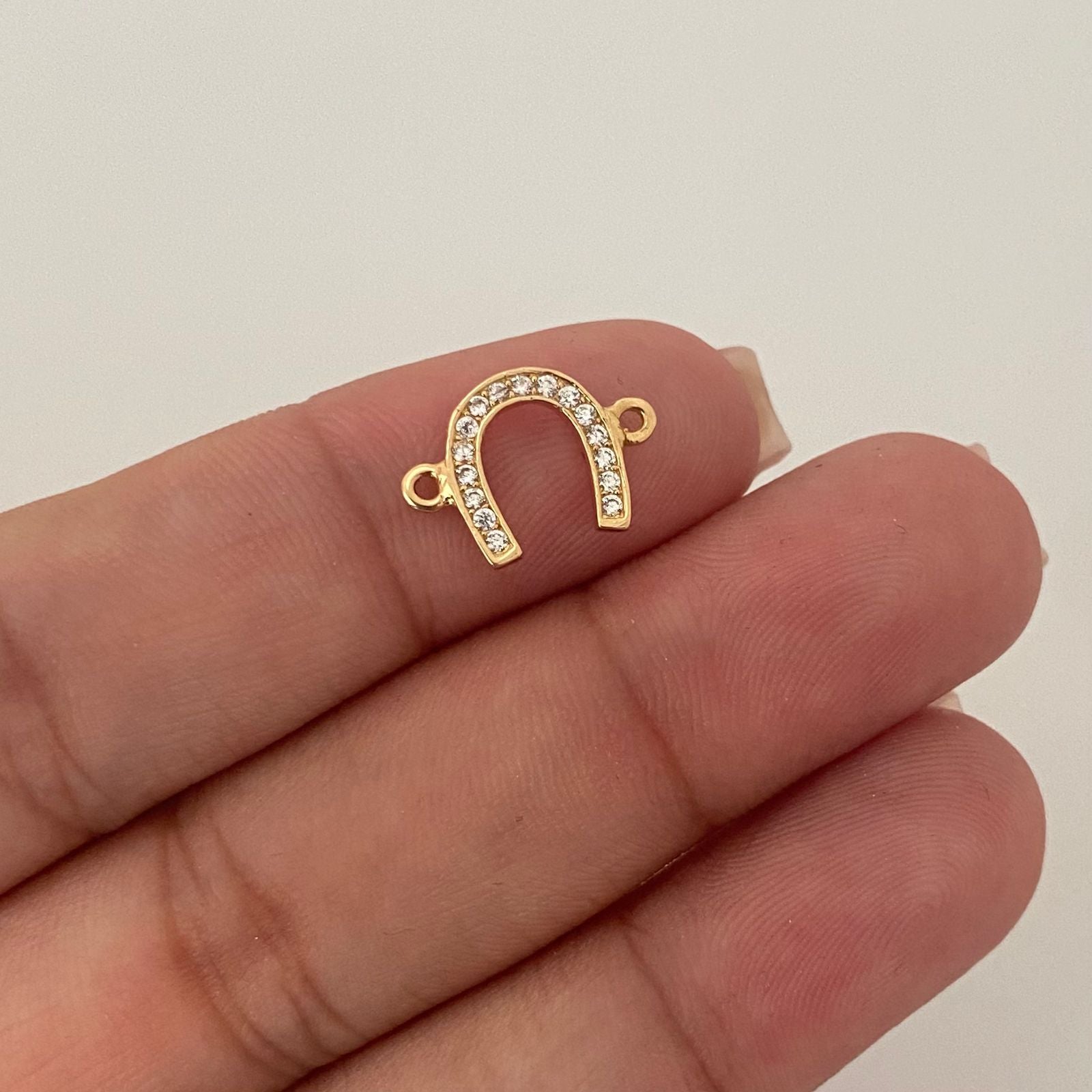 Herraje herradura de caballo casting Oro amarillo 18k 0,75 Gr / 1,5 Cm