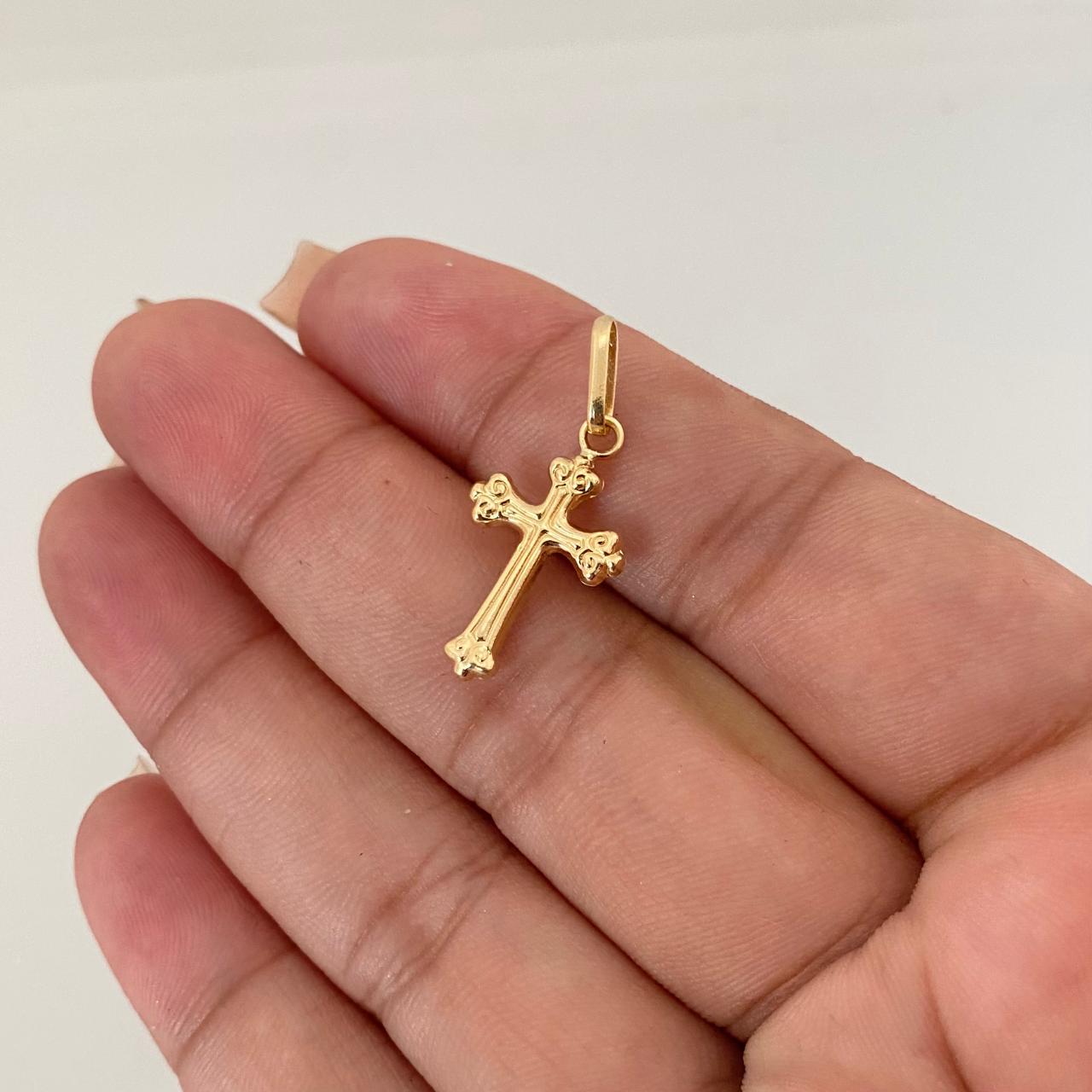 Dije cruz con ornamentos Oro amarillo 18k 0,85 Gr / 1,7 Cm