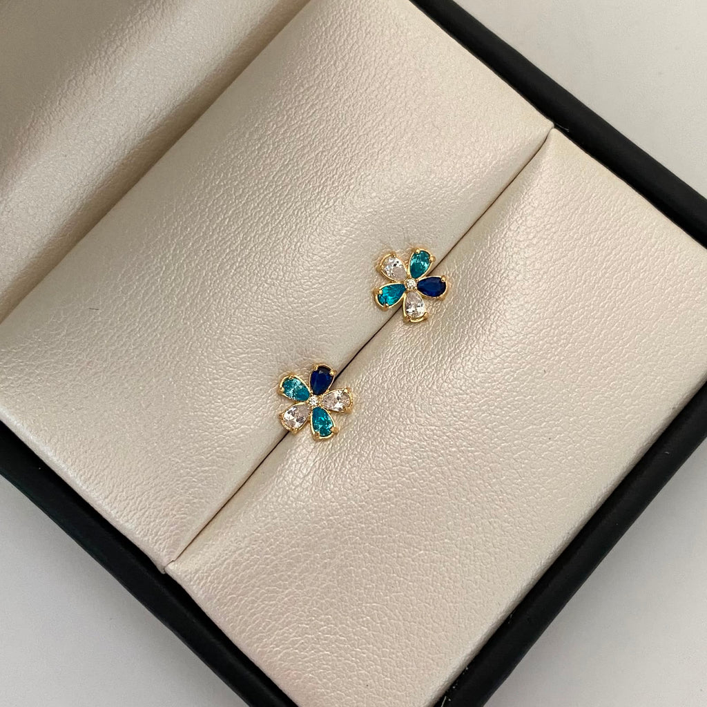 Topos flor circones azules Oro amarillo 18k 1 Gr / 8 mm