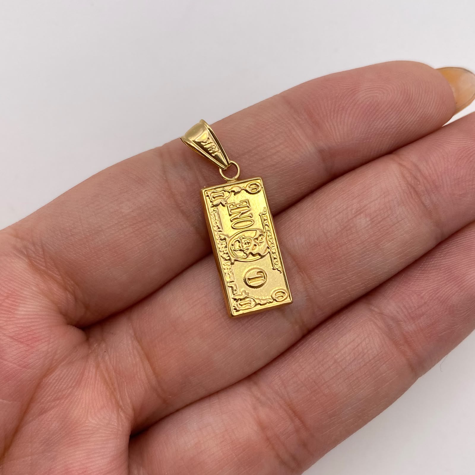 Dije dolar Oro amarillo 18k 1,15 Gr / 9,4 mm / 3 Cm