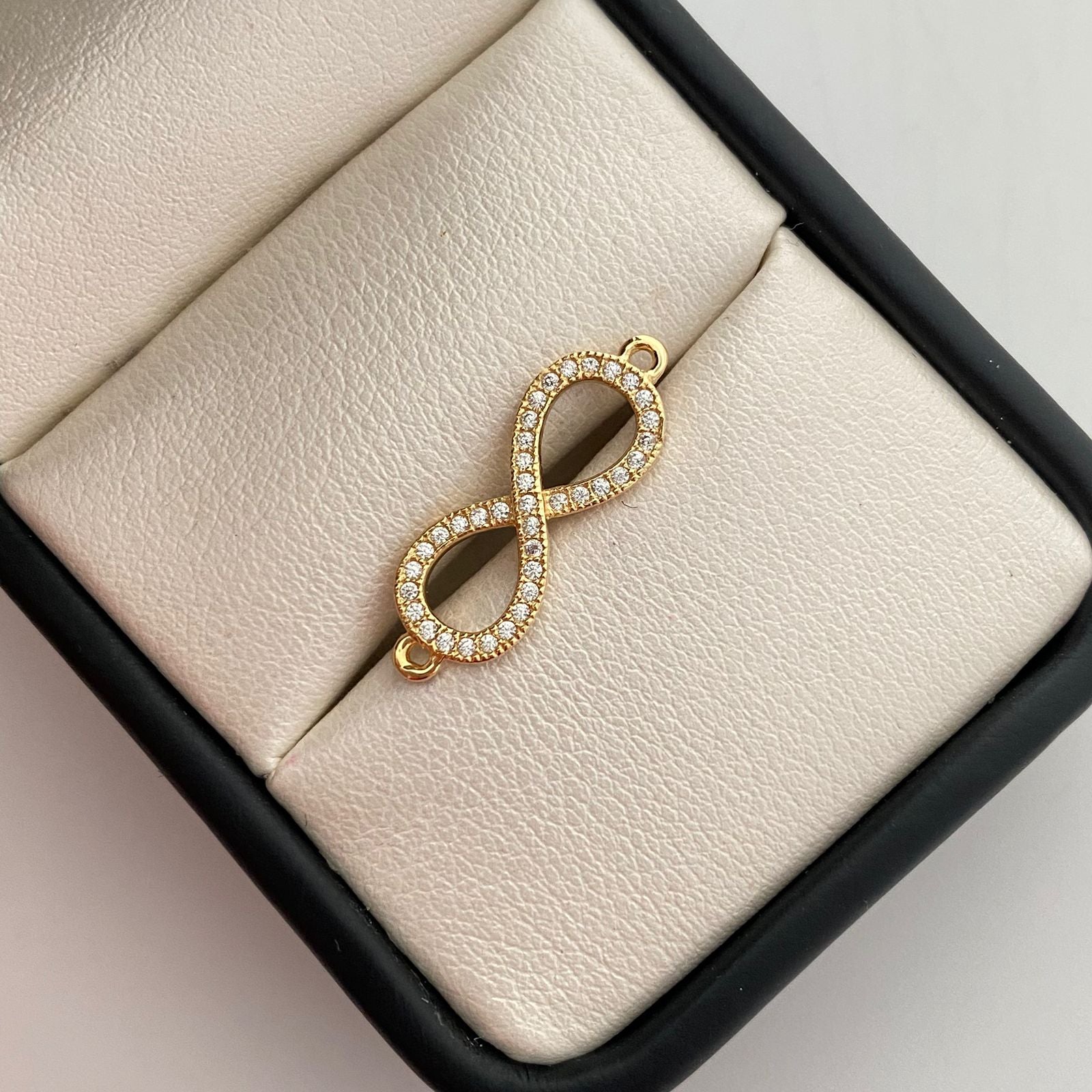 Herraje infinito con circones blancos  Oro amarillo 18k 1,25 Gr / 2 Cm