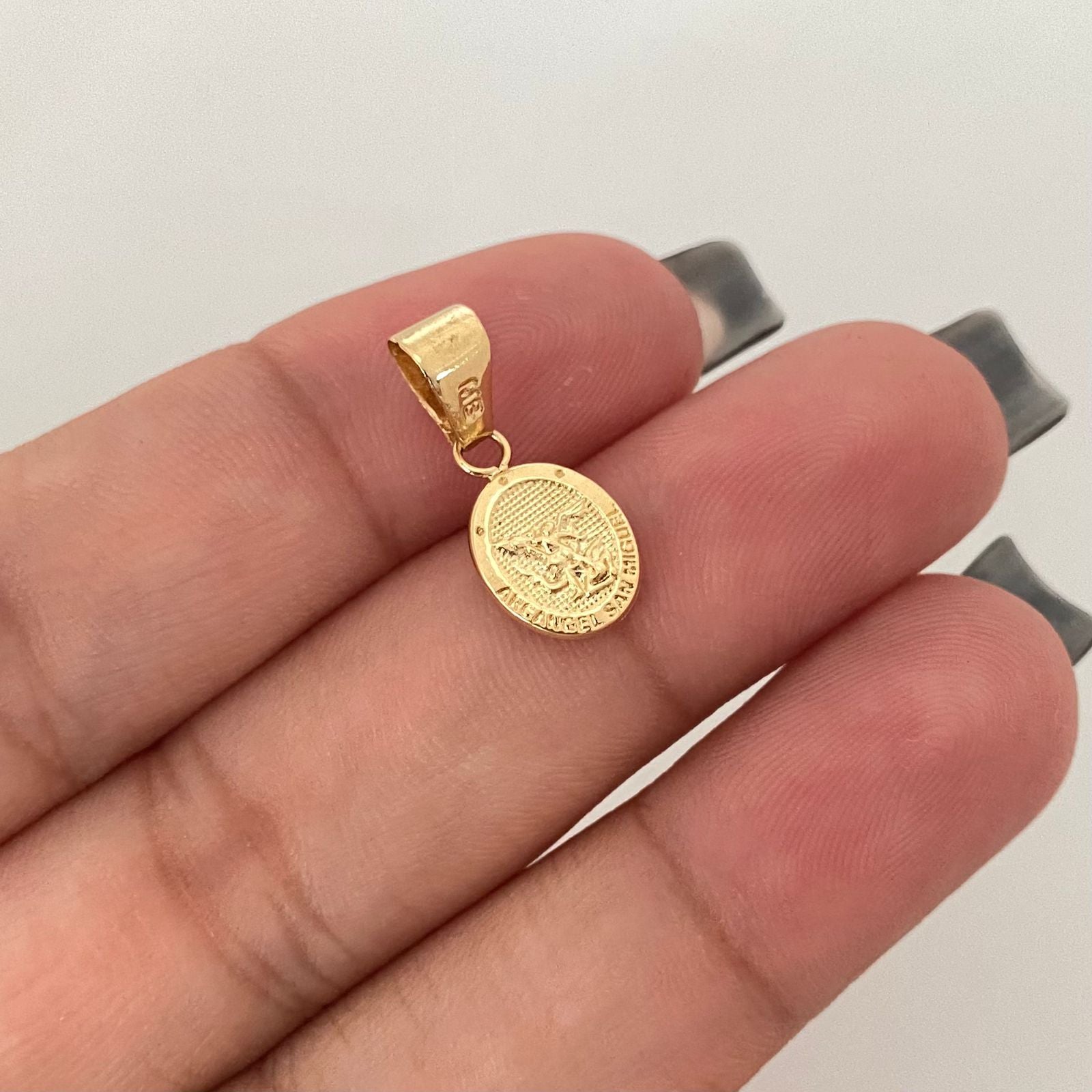 Dije san miguél arcangel Oro amarillo 18k 0,55 Gr / 2,0 Cm