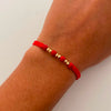 Pulsera tejida Bolas diamantadas 3mm Hilo Rojo Oro amarillo 18k 0,25 Gr
