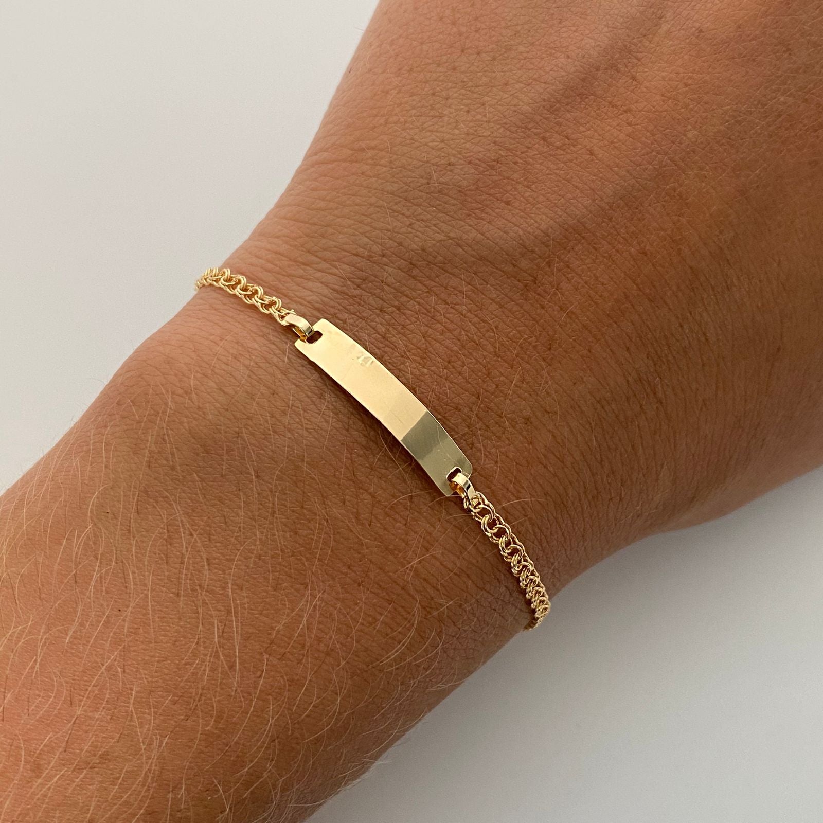Pulso bebé aro seguido placa rectangular  Oro amarillo 18k 1,50 Gr / 4,4 mm / 15 Cm Broche 0,15