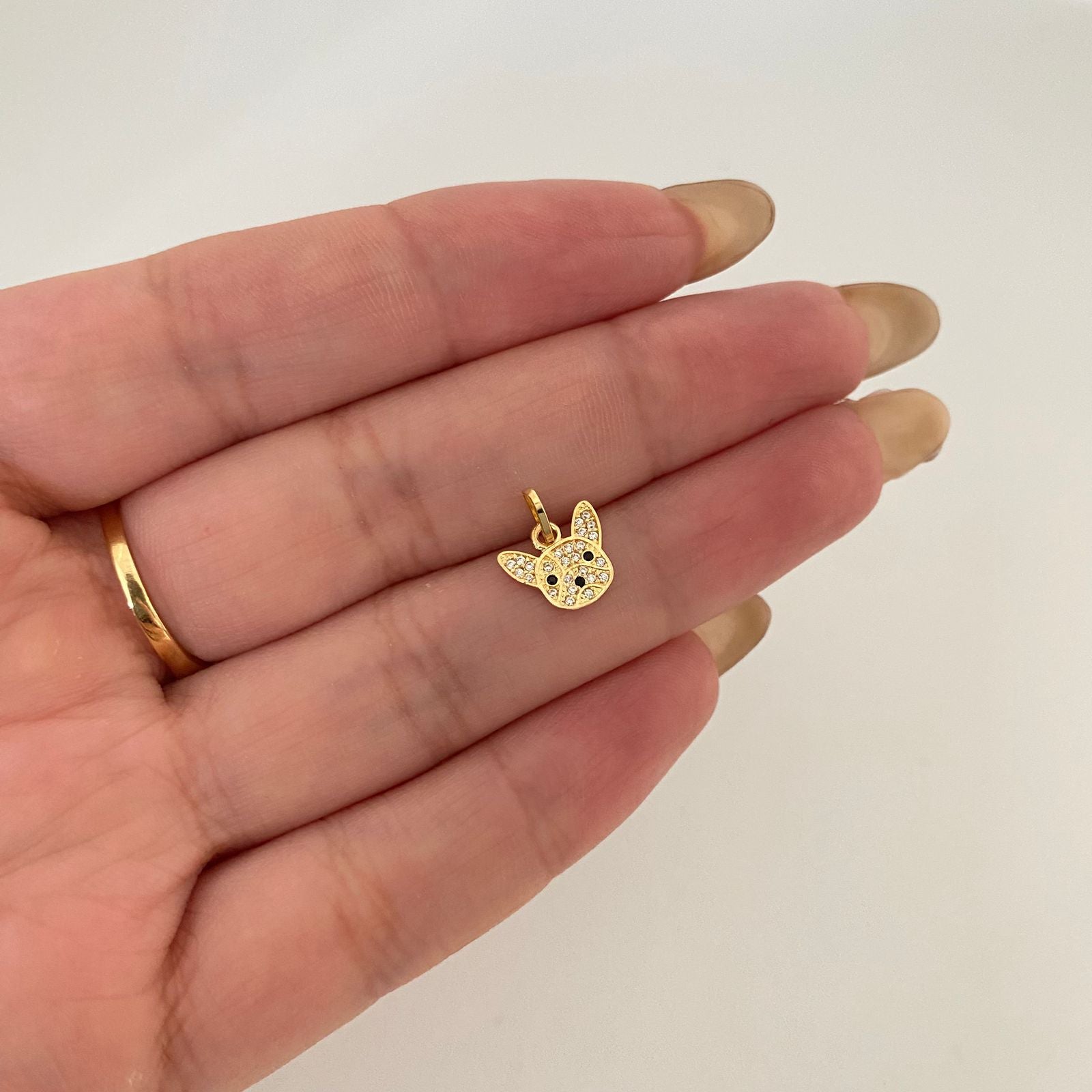 Dije perro casting Oro amarillo 18k 0,6 Gr / 1,2 Cm