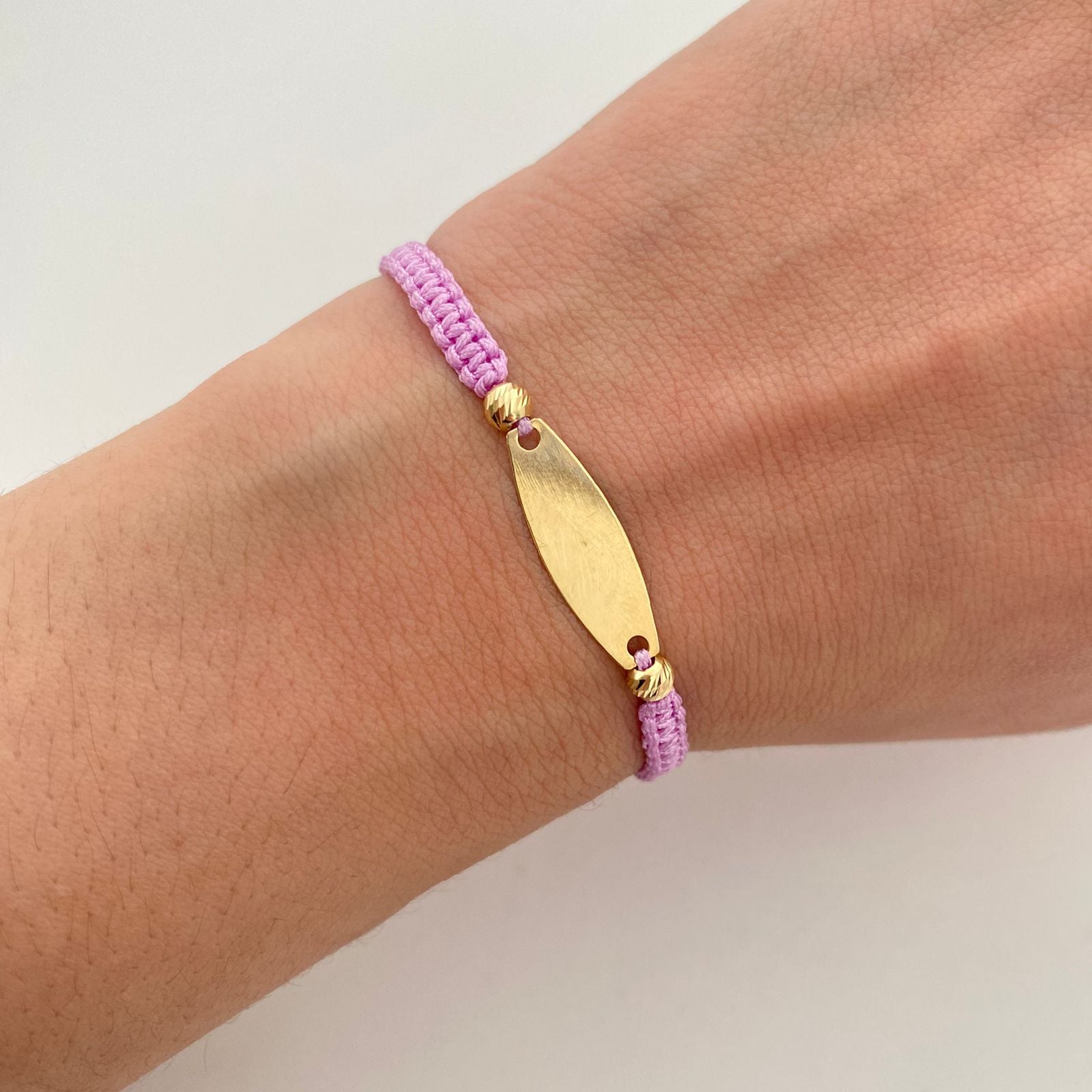 Pulsera tejida con placa ovalada y balines diamantadas 4mm  Oro amarillo 18k 0,8 Gr