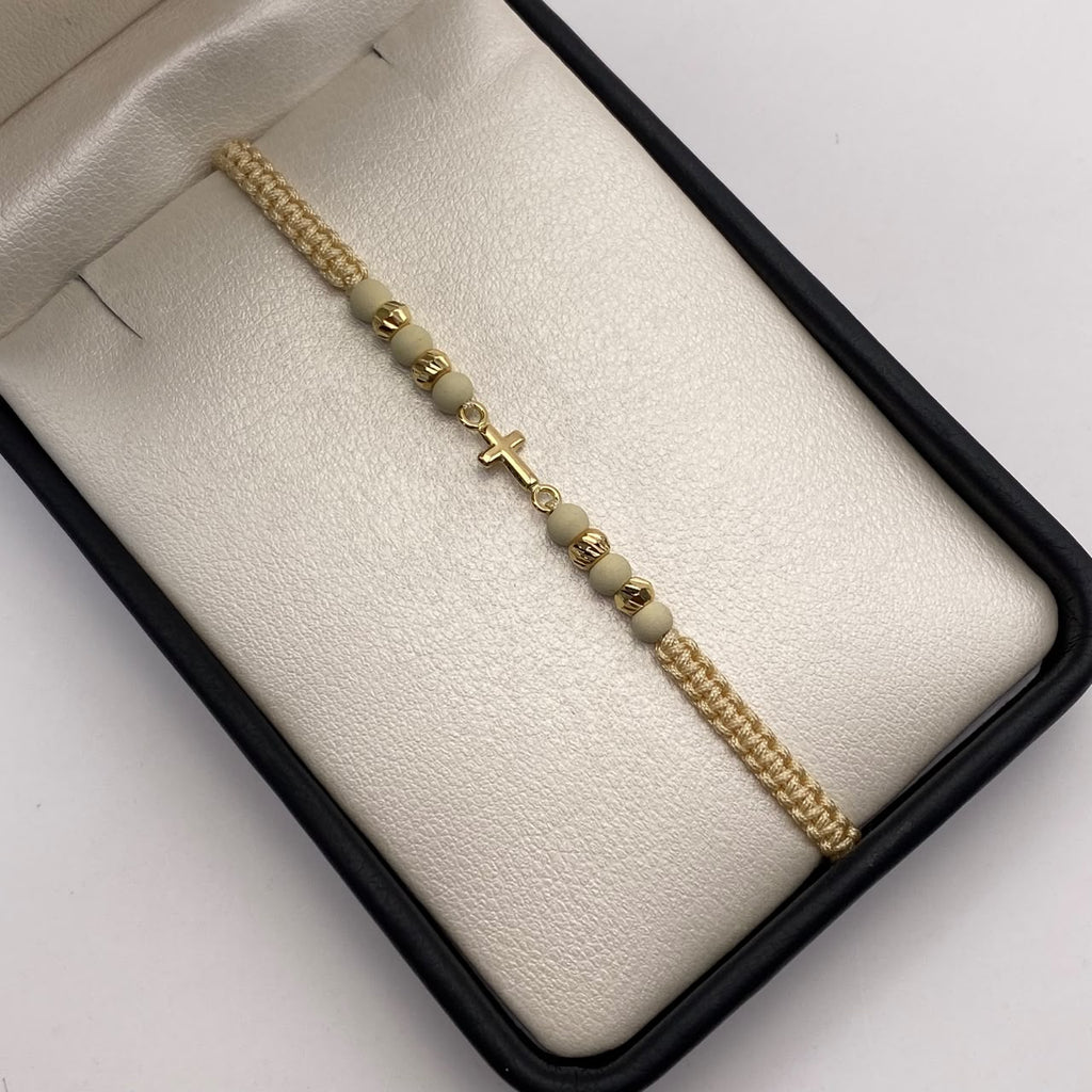 Pulsera tejida Herraje cruz lisa bolas diamantadas 4mm hilo beige  Oro amarillo 18k 0,45 Gr