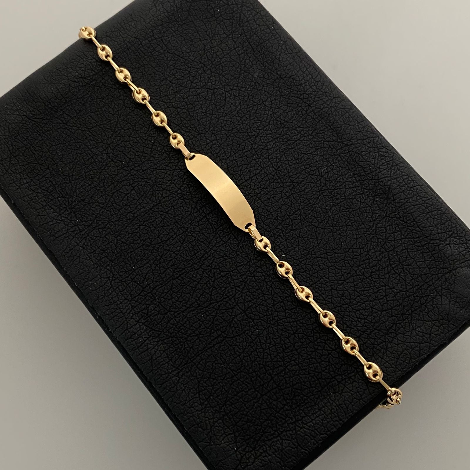 Pulso bebé gc placa semi rectangular  Oro amarillo 18k 1,90 Gr / 5,1 mm / 16,5 Cm Broche 0,15