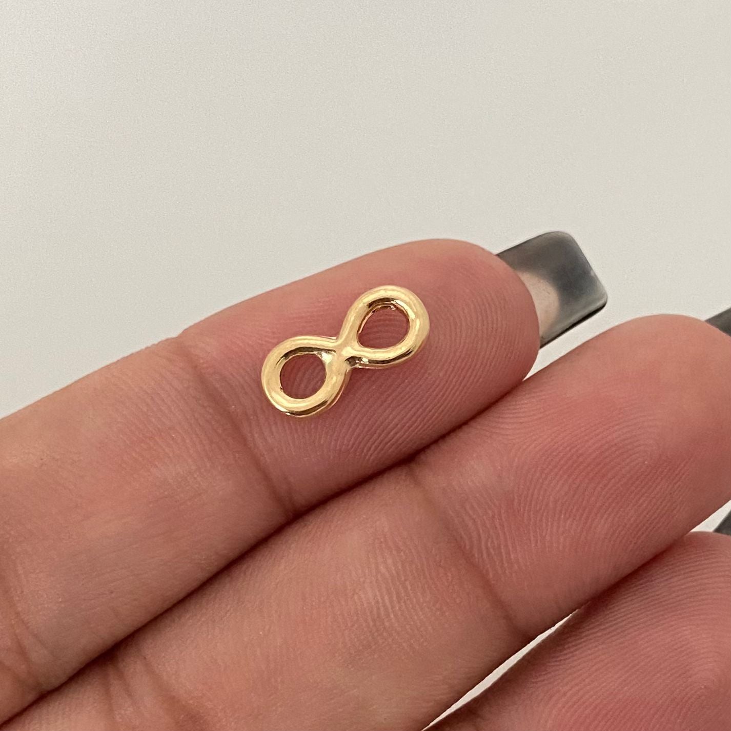 Herraje infinito Oro amarillo 18k 0,35 Gr / 1,0 Cm