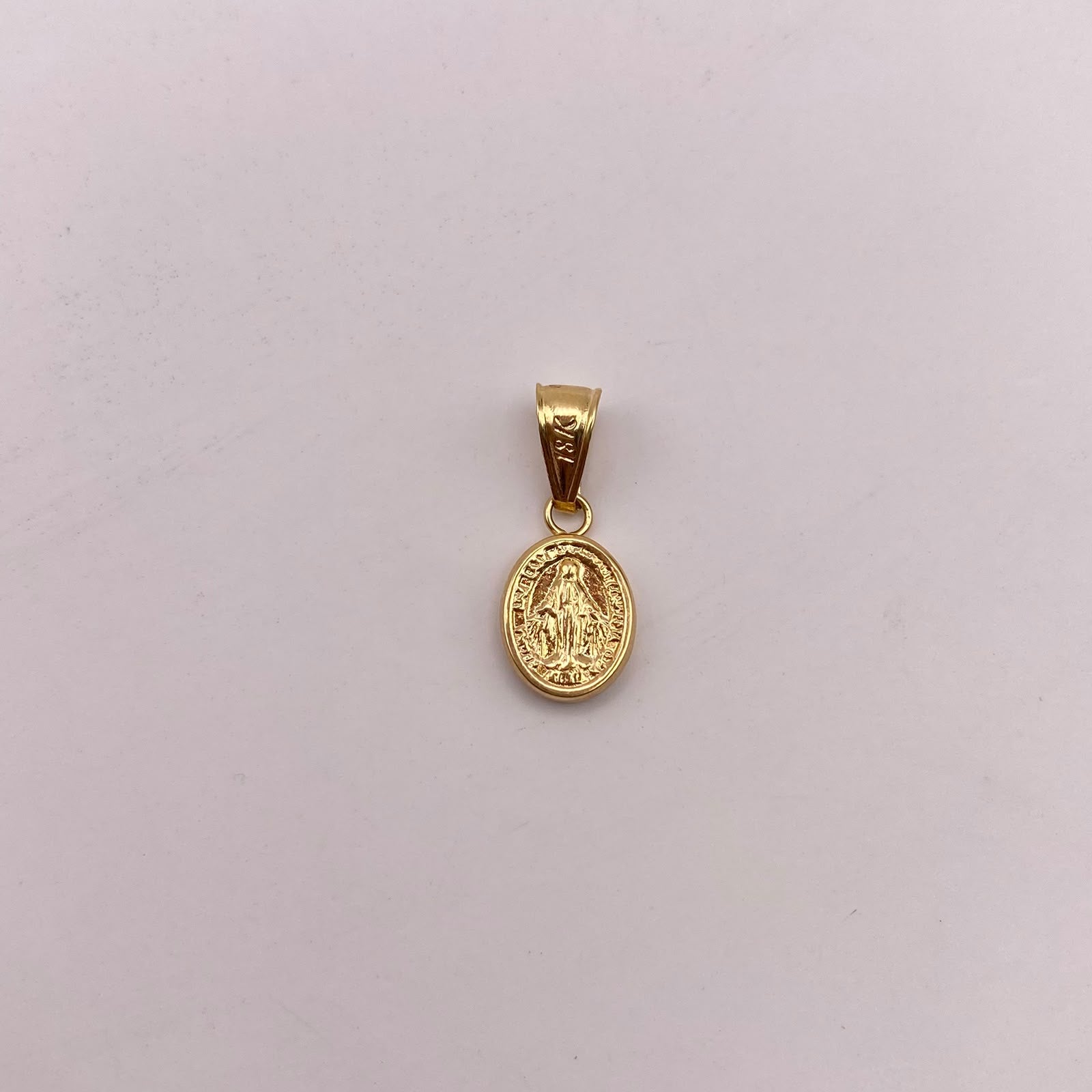 Dije virgen milagrosa Oro amarillo 18k 0,55 Gr / 8,26 mm / 2 Cm
