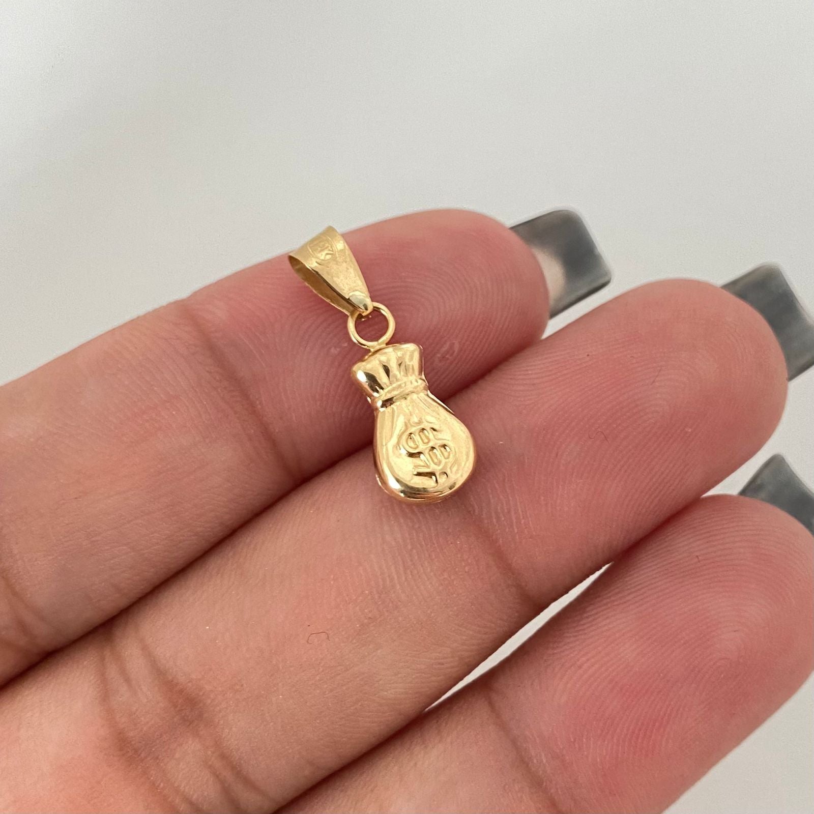 Dije bolsa de dinero Oro amarillo 18k 0,5 Gr / 1,7 Cm