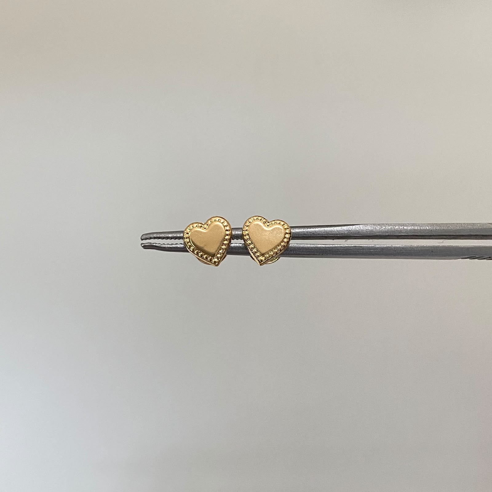Topos corazon plano liso  Oro amarillo 18k 0,45 Gr / 7 mm