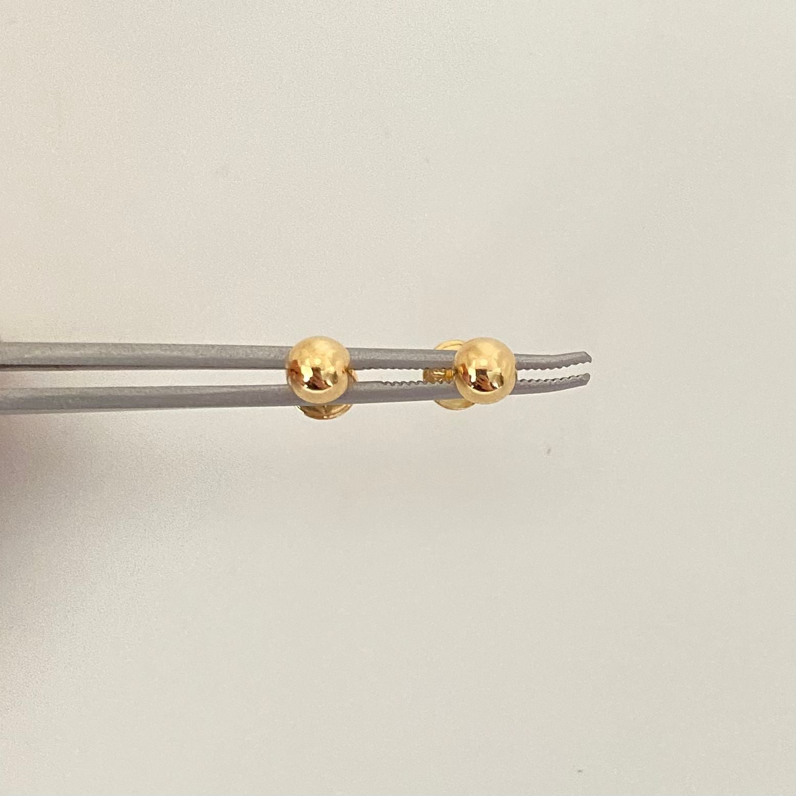 Topos bola lisa Oro amarillo 18k 0,55 Gr / 5 mm