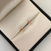 Topos flor centro fucsia Oro amarillo 18k 0,6 Gr