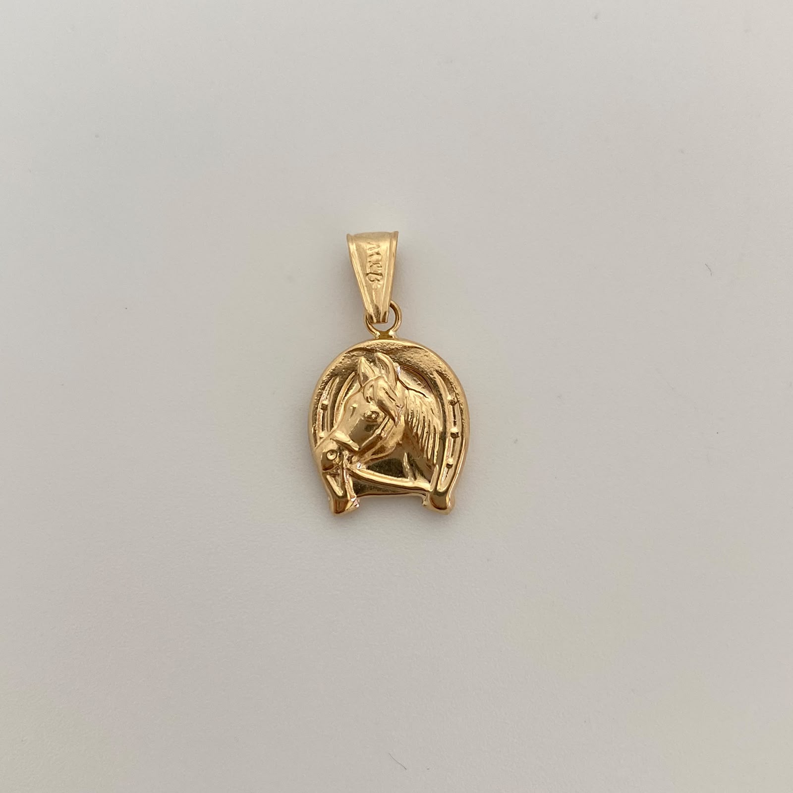 Dije Herradura de Caballo Oro amarillo 18k 0,95 Gr / 12,6 mm / 2,3 Cm
