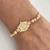 Pulsera tejida con herraje rx y bolas diamantadas 5mm y 4mm  Oro amarillo y Oro rosa 18k 4 Gr