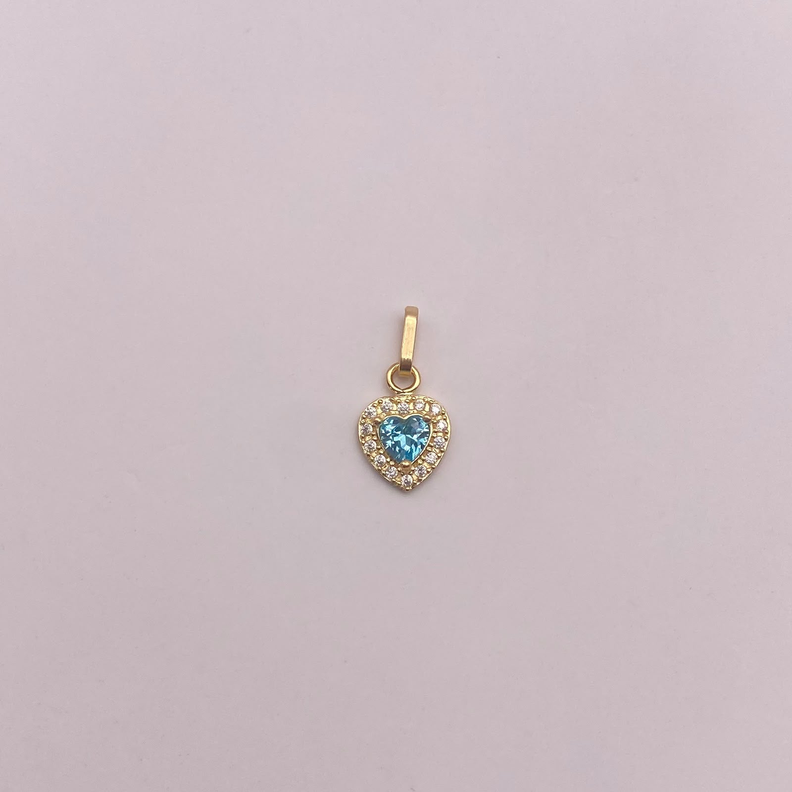 Dije Corazon circon azul y blancos Oro amarillo 18k 0,7 Gr / 7,7 mm / 1,5 Cm