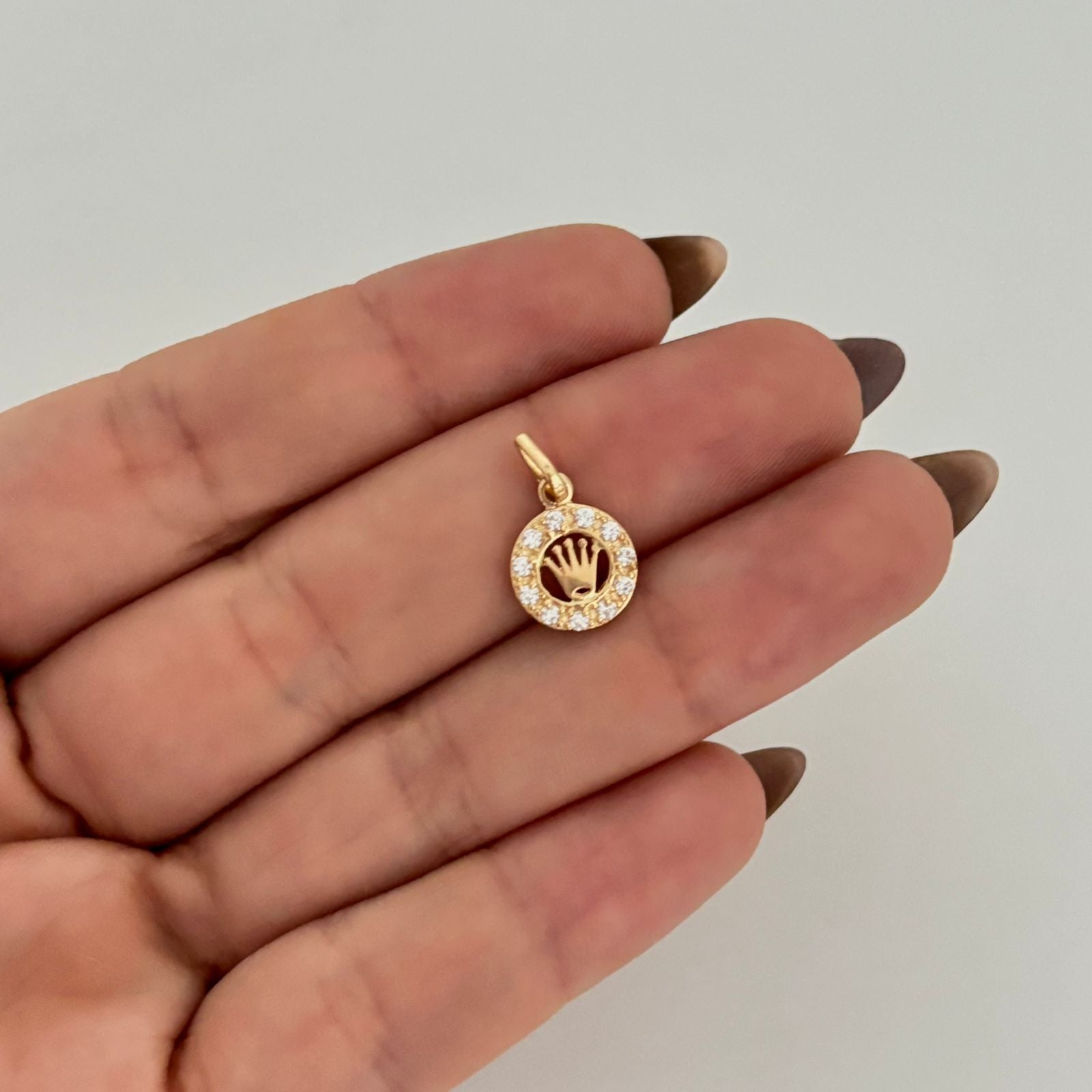 Dije corona rx casting Oro amarillo 18k 1,05 Gr / 1,8 Cm