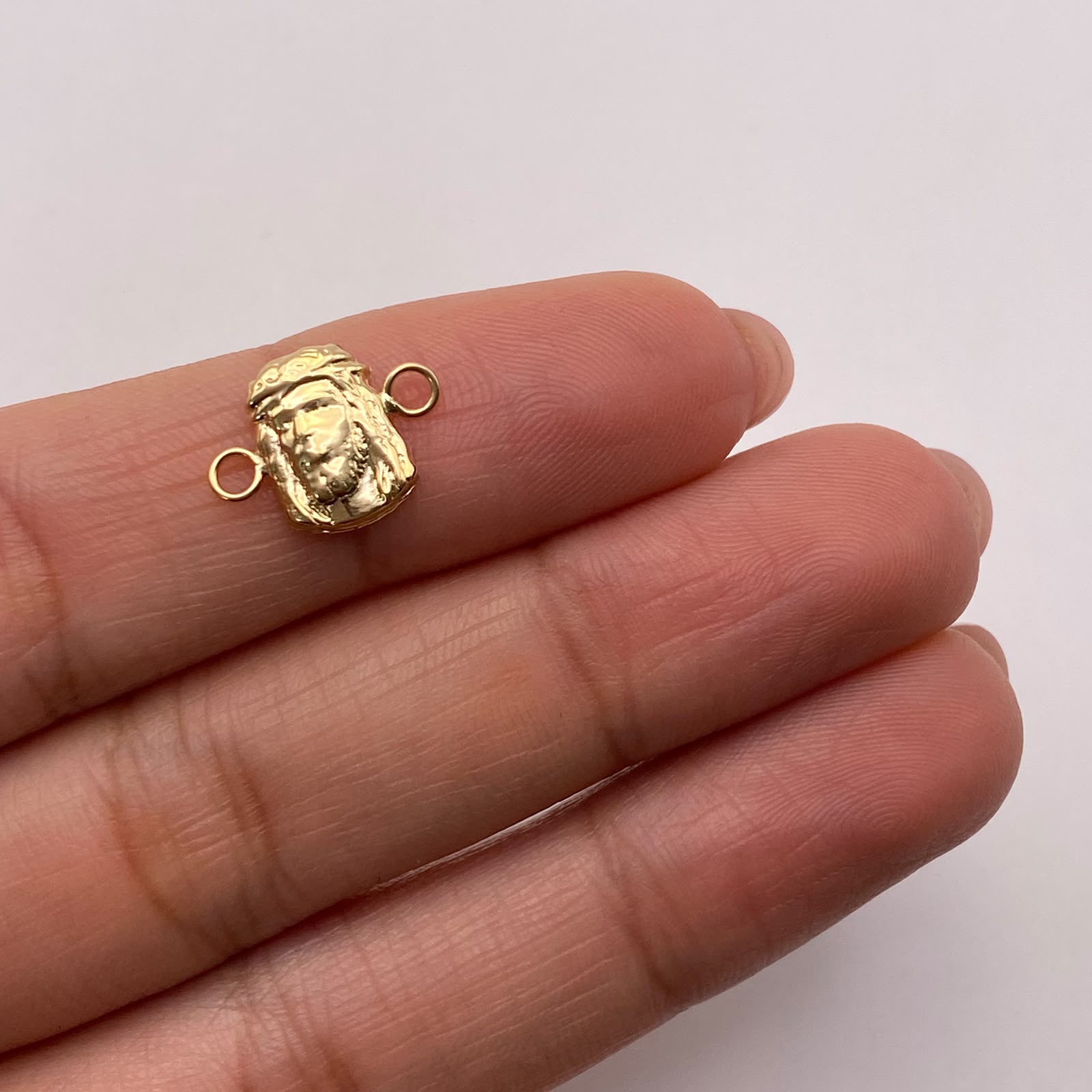 Herraje rostro jesus Oro amarillo 18k 0,43 Gr / 1,3 Cm
