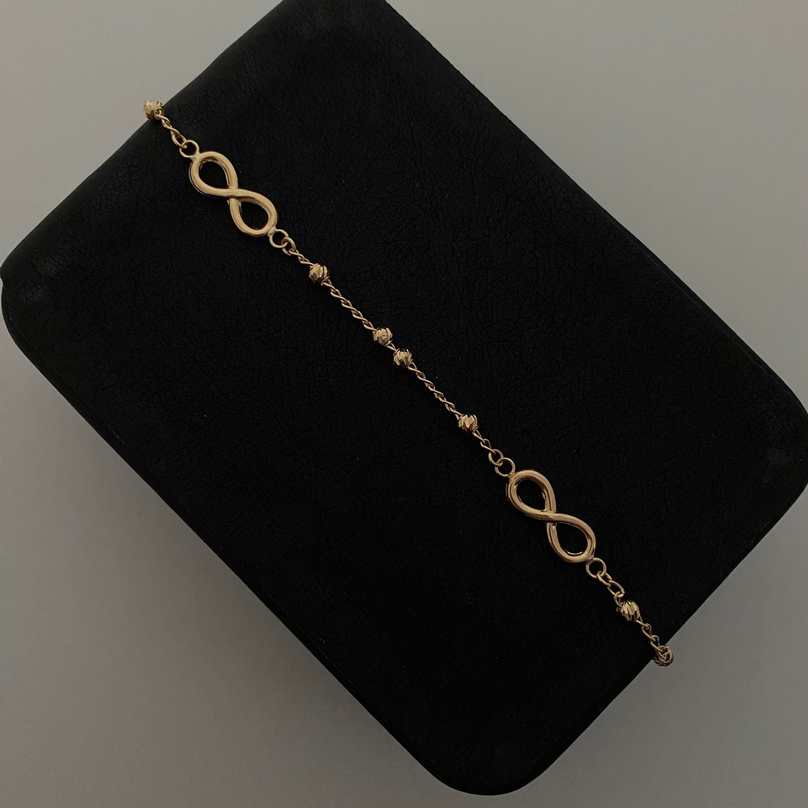 Pulso tipo militar con herrajes de infinito  Oro amarillo 18k 2,85 Gr / 2,98 mm / 18 Cm Broche 0,40