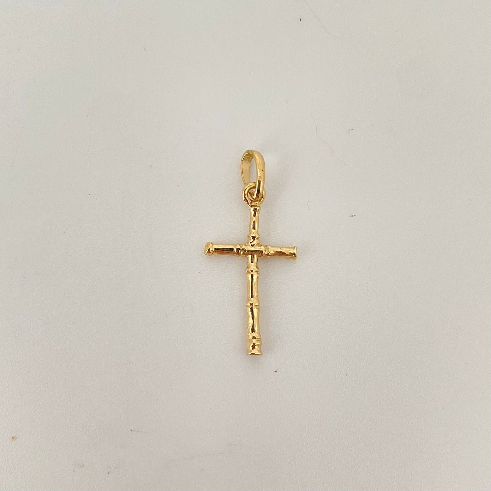 Dije cruz tipo espiga  Oro amarillo 18k 1 Gr / 2,5 Cm