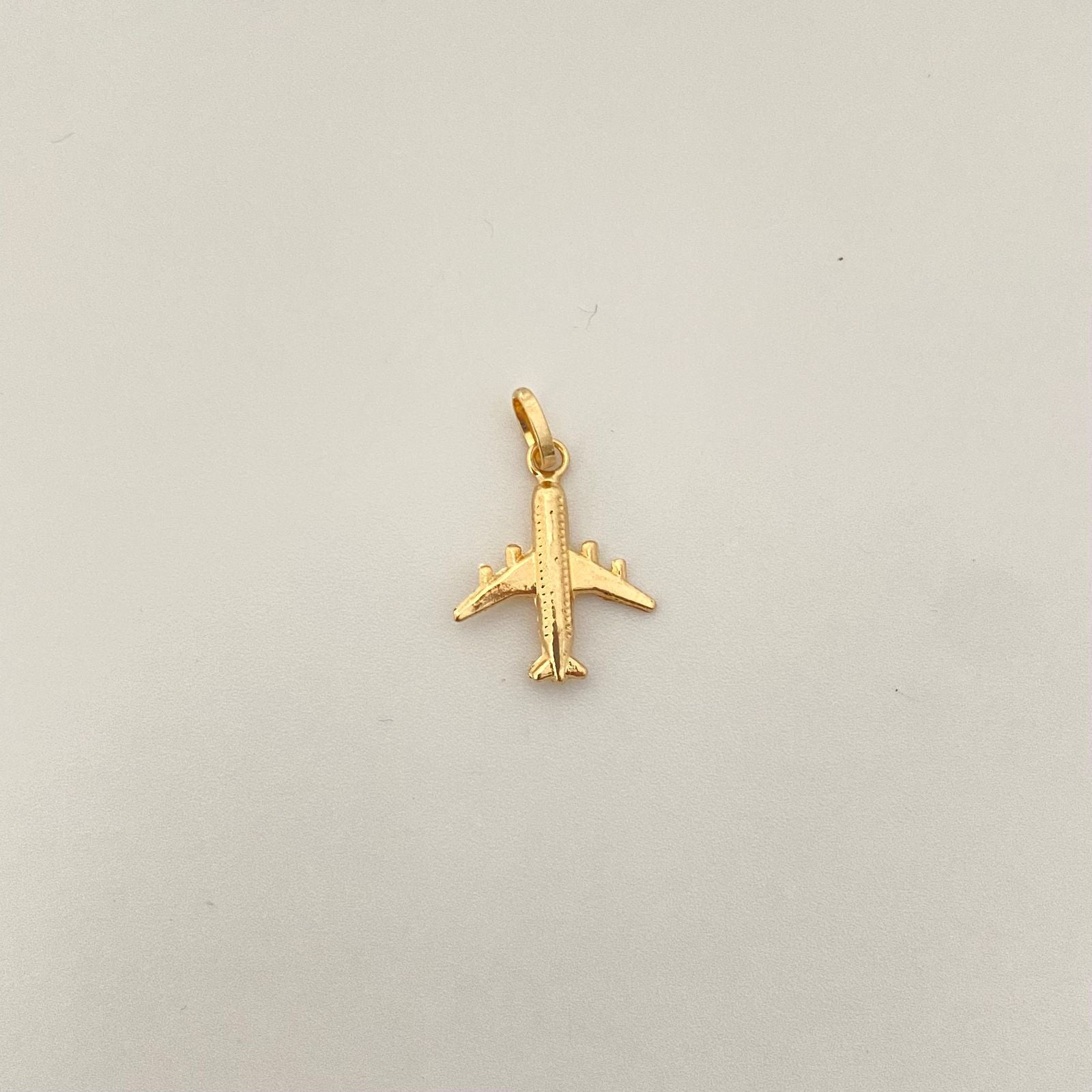 Dije avion Oro amarillo 18k 0,45 Gr / 2,0 Cm