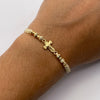 Pulsera tejida Herraje cruz cristo bolas diamantadas 4mm y 3mm hilo beige Oro amarillo 18k 0,9 Gr