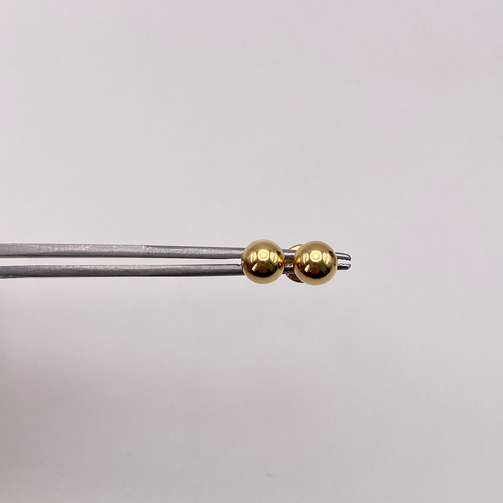 Topos bola lisa 6mm Oro amarillo 18k 0,7 Gr
