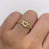 Anillo corazón lineas circones blancos Oro amarillo 18k / Talla 8 / 1,48 Gr / 1,5 mm