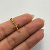 Dije Cruz multicolor Oro amarillo 18k 0,65 Gr / 9,8 mm / 2 Cm