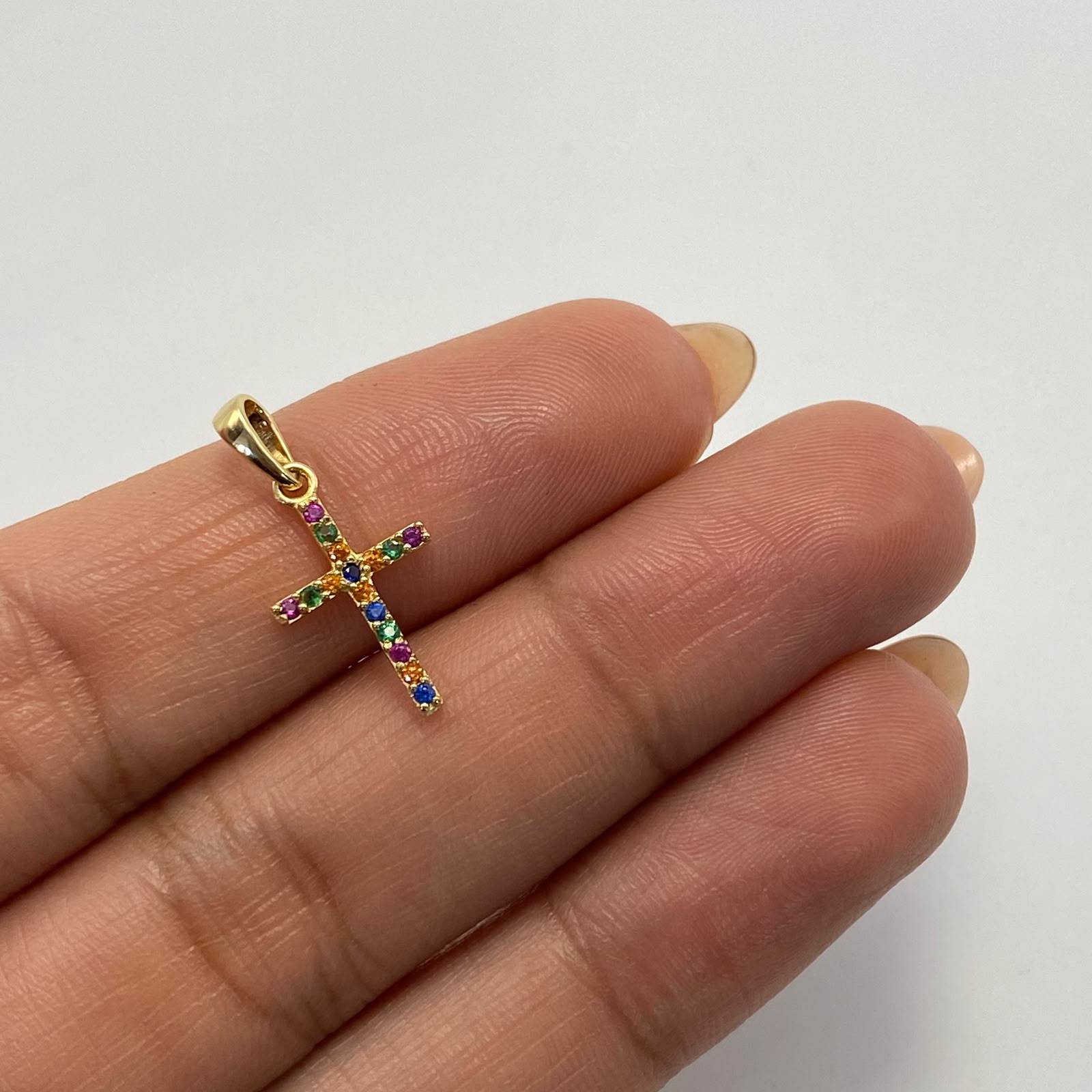 Dije Cruz multicolor Oro amarillo 18k 0,65 Gr / 9,8 mm / 2 Cm