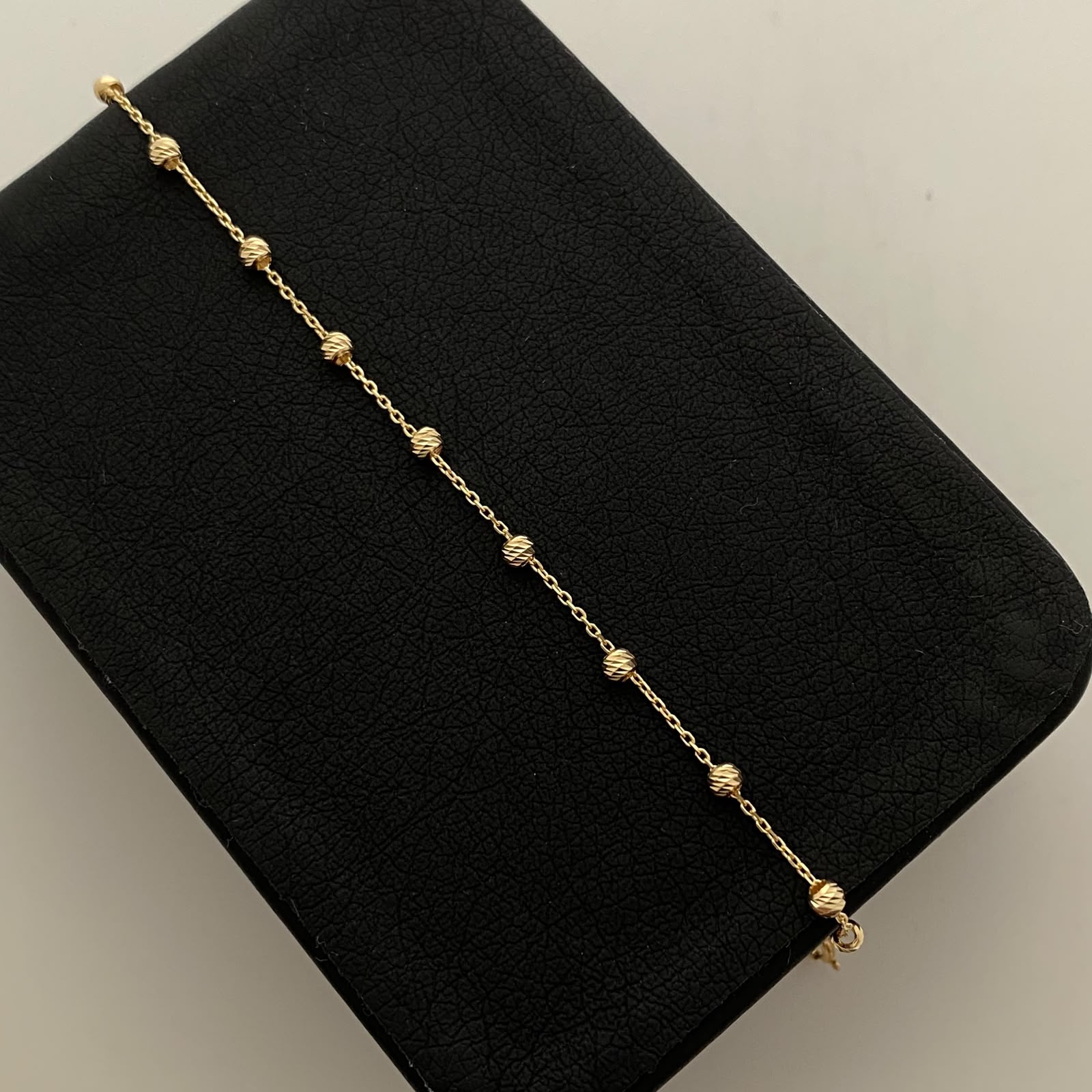 Pulso It Mini Rollon bolas diamantadas 3mm Oro amarillo 18k +4 / 1,55 Gr / 0,7 mm / 19 Cm