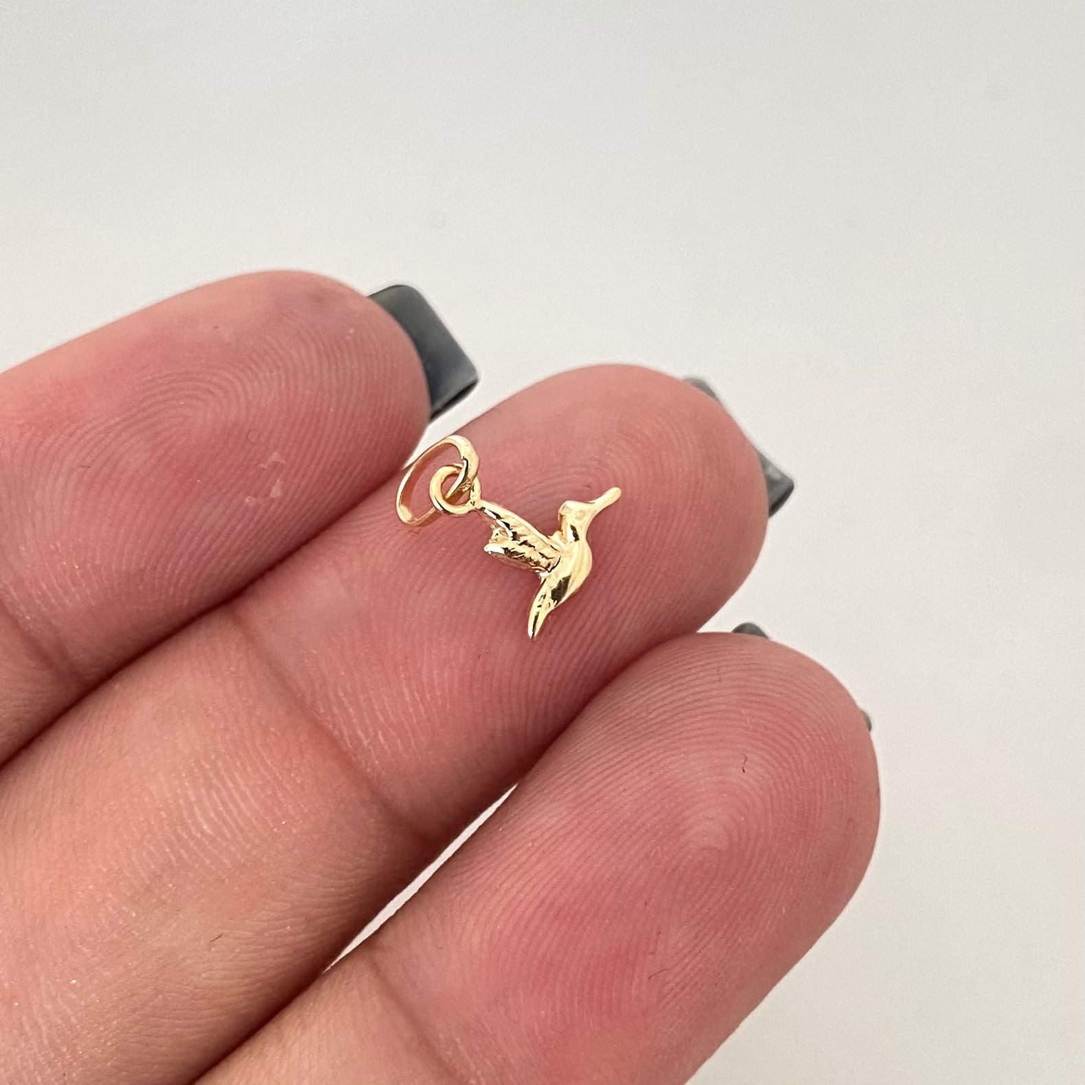 Dije colibrí mini Oro amarillo 18k 0,20 Gr / 1,2 Cm