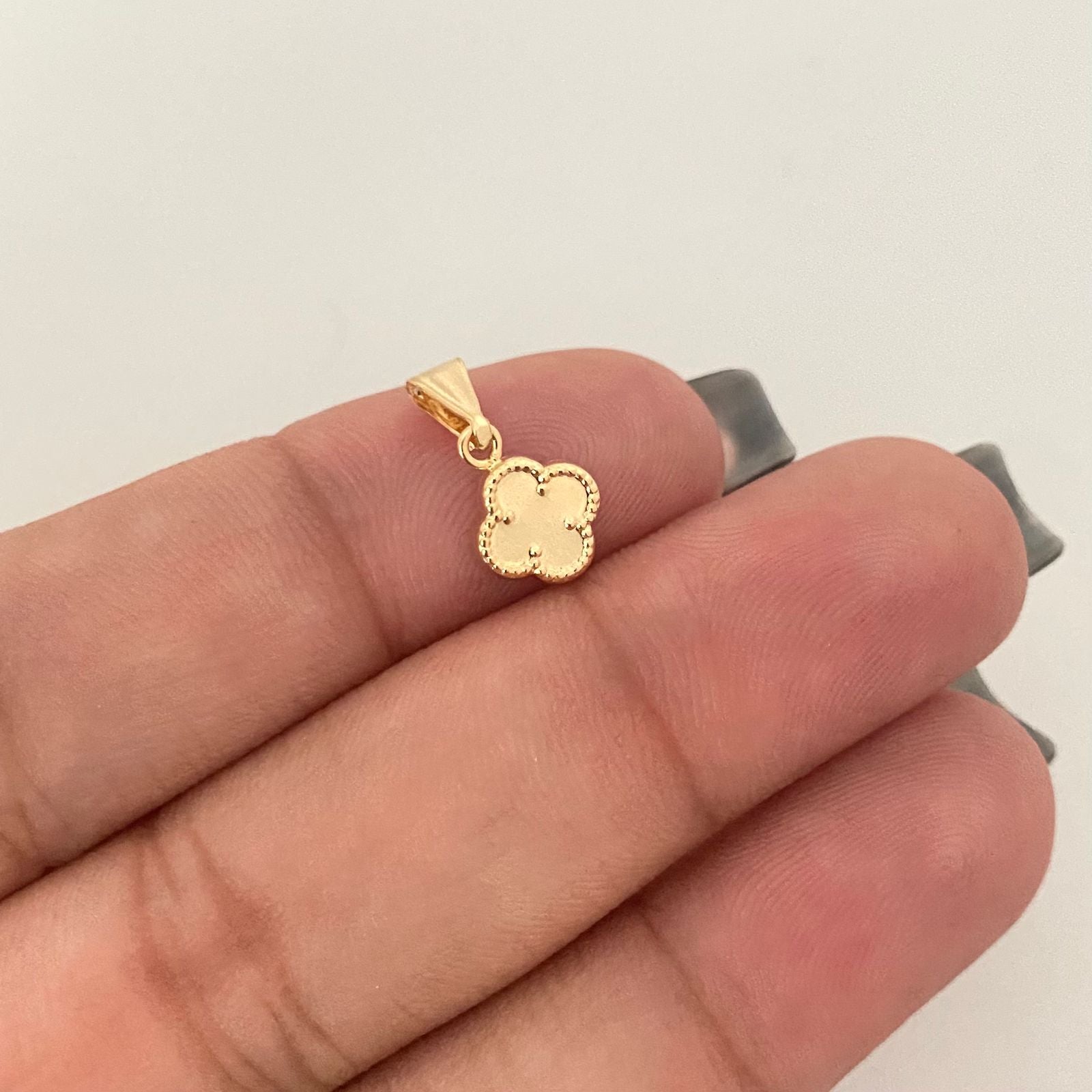 Dije trebol  Oro amarillo 18k 0,35 Gr / 1,5 Cm