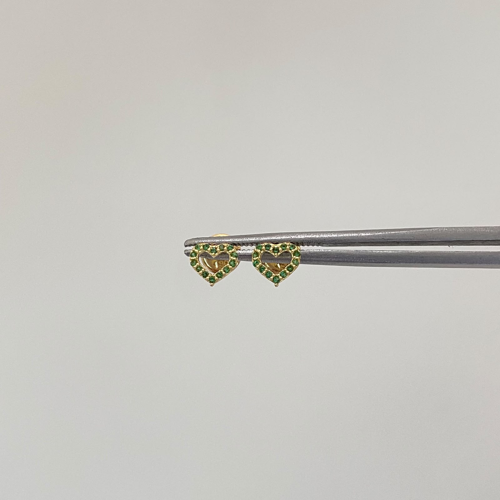 Topos silueta corazon circones verdes Oro amarillo 18k 0,6 Gr / 5 mm