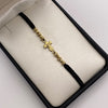 Pulsera tejida Herraje cruz cristo bolas diamantadas 4mm y 3mm hilo negro Oro amarillo 18k 0,9 Gr