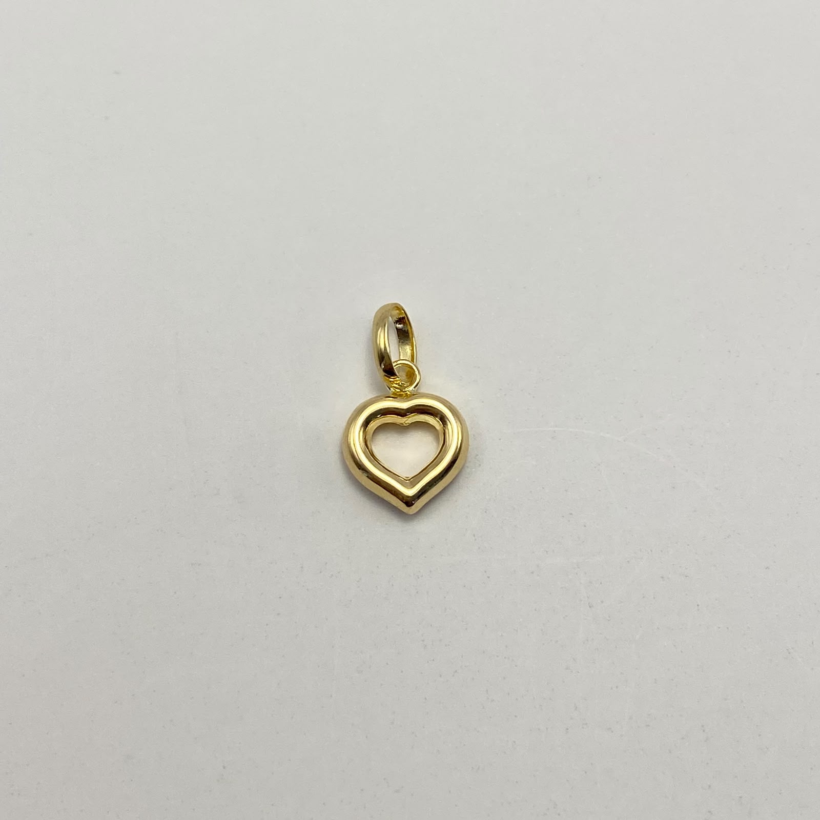 Dije Corazon silueta Oro amarillo 18k 0,4 Gr / 8,5 mm / 1,4 Cm
