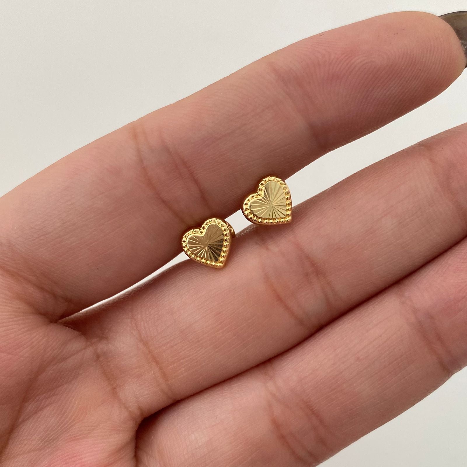 Topos Corazon fondo diamantado Oro amarillo 18k 0,7 Gr / 7 mm