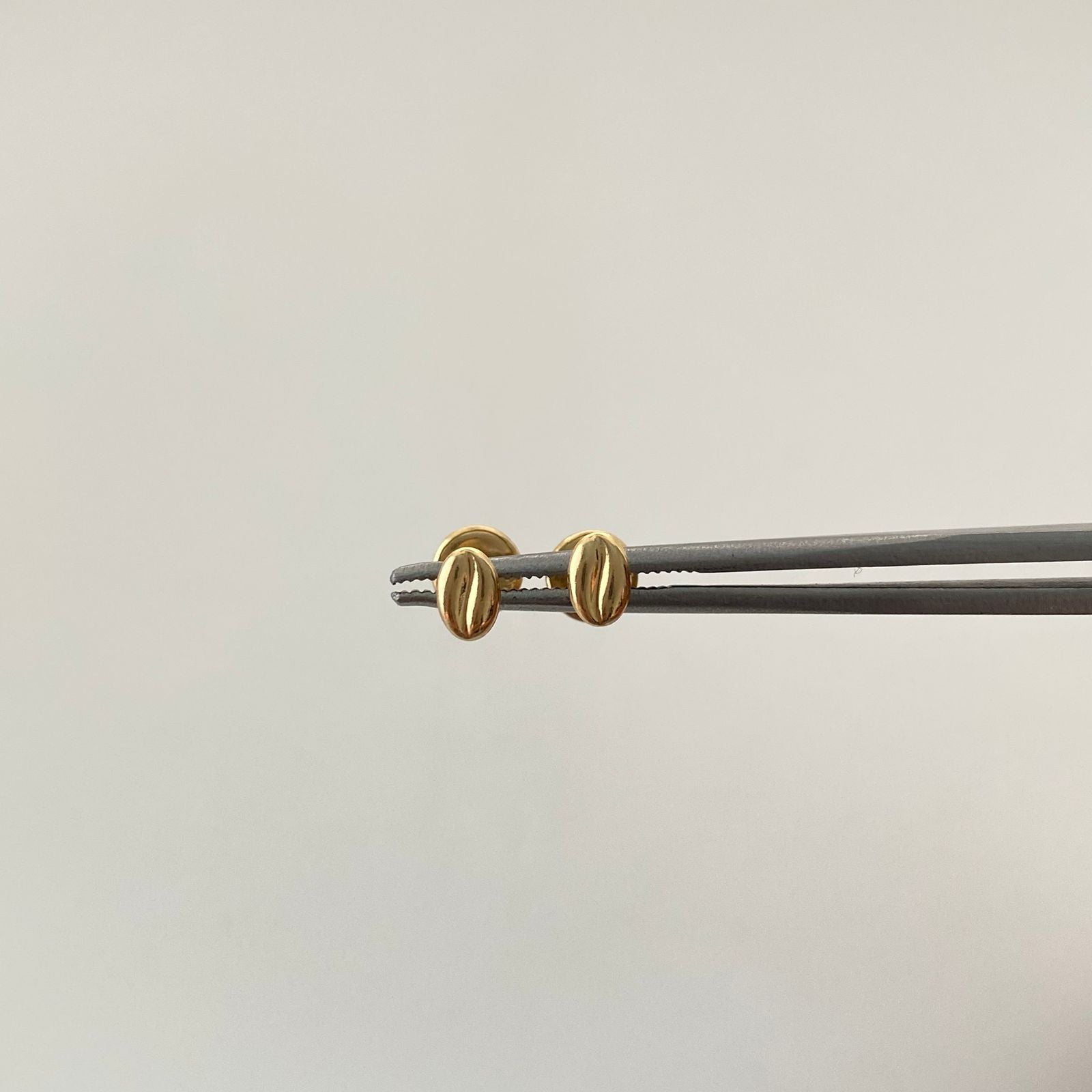 Topos Granito de café Oro amarillo 18k 0,47 Gr / 3,5 mm