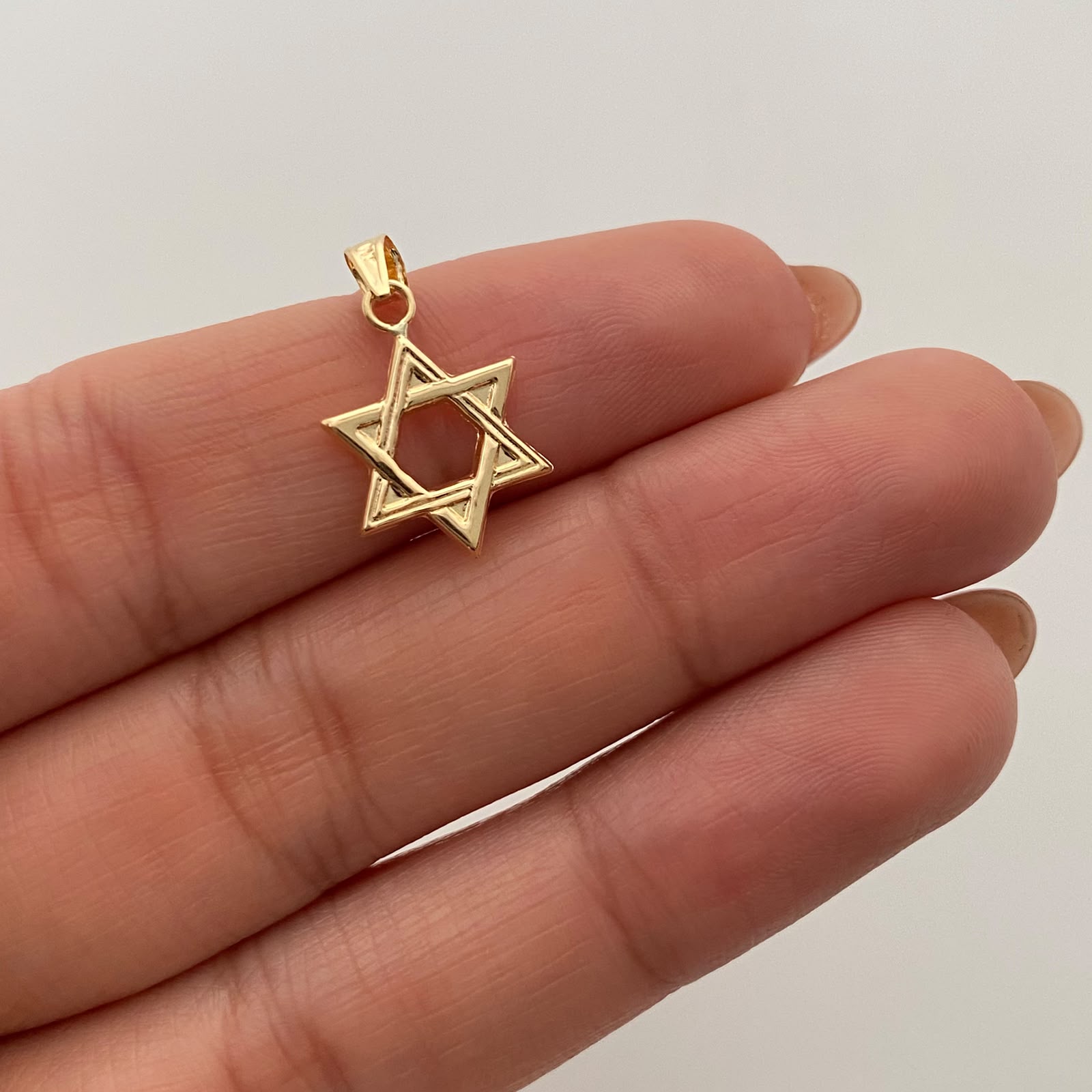 Dije Estrella de David Oro amarillo 18k 0,55 Gr / 11,5 mm / 2 Cm