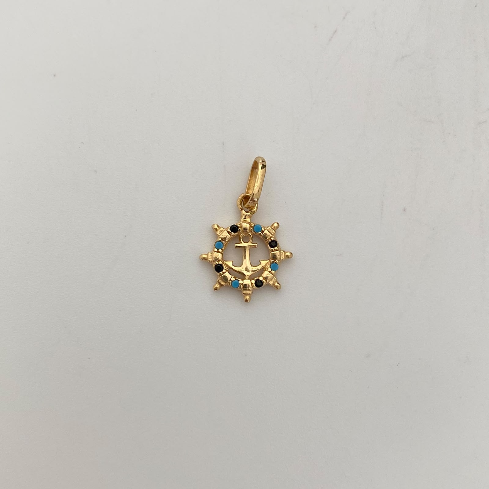 Dije Timon Ancla Oro amarillo 18k 0,95 Gr / 11,6 mm / 1,7 Cm