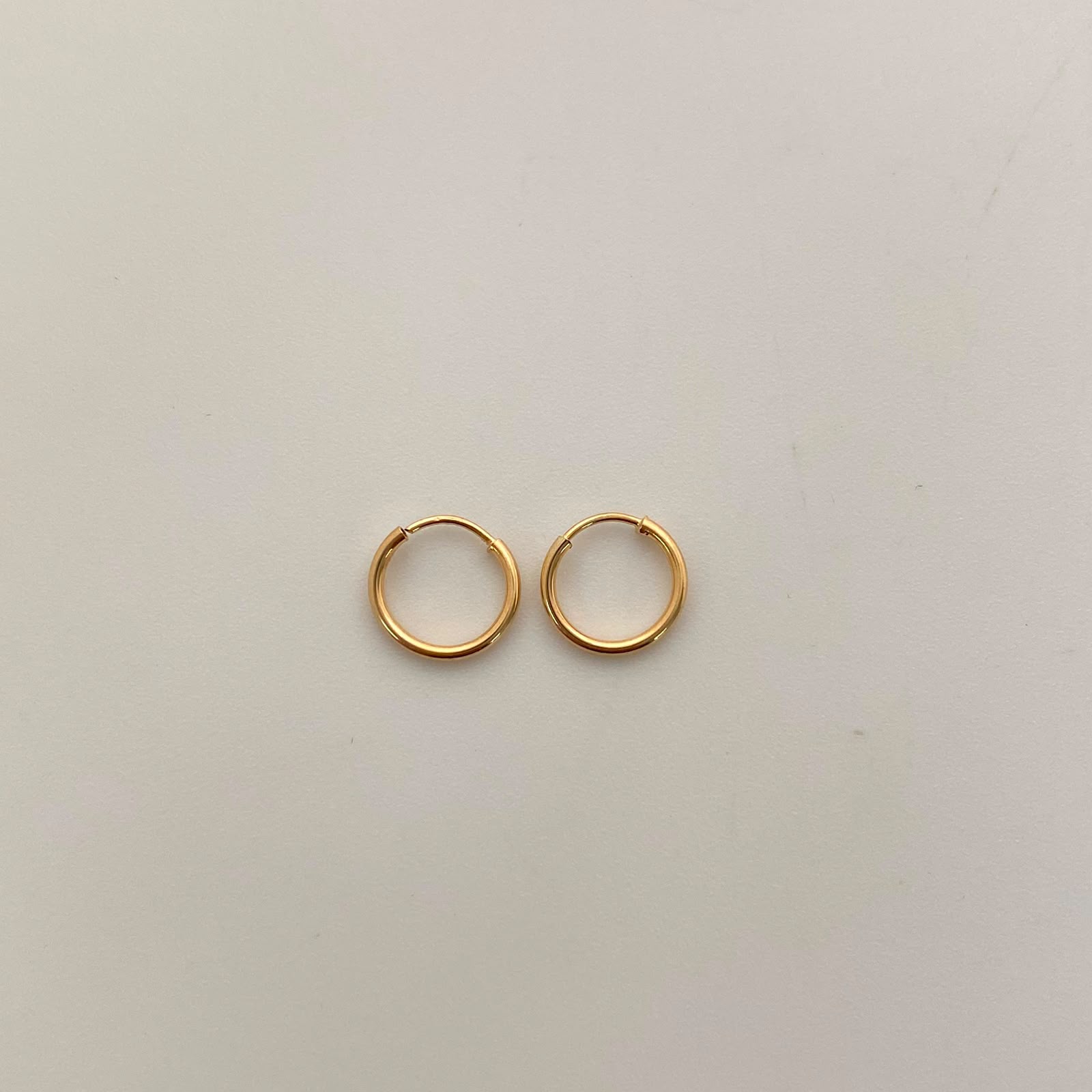 Candonga imperdibles Oro amarillo 18k 0,35 Gr / 0,8 Cm